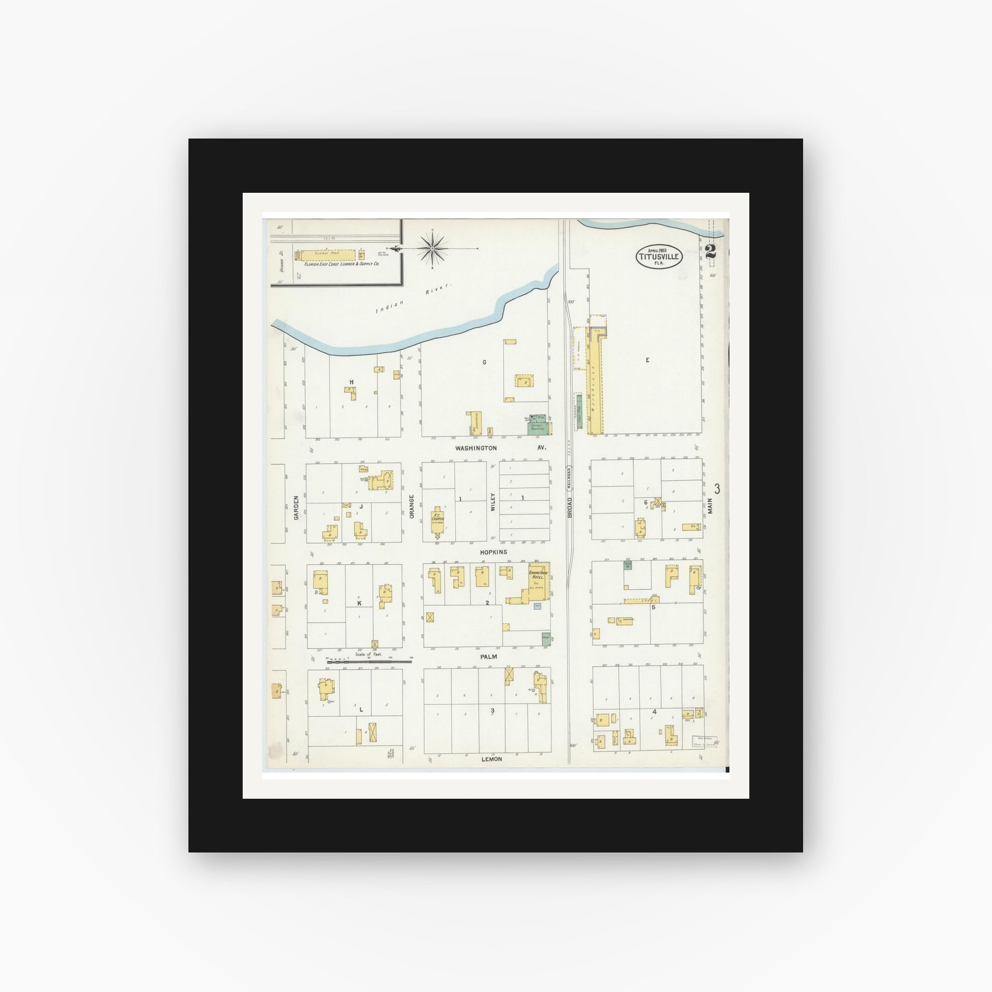 Old map wall art mockup — black gallery frame with white mat — Sanborn Fire Insurance Map from Titusville, Brevard County, Florida (1903), Sheet #0002