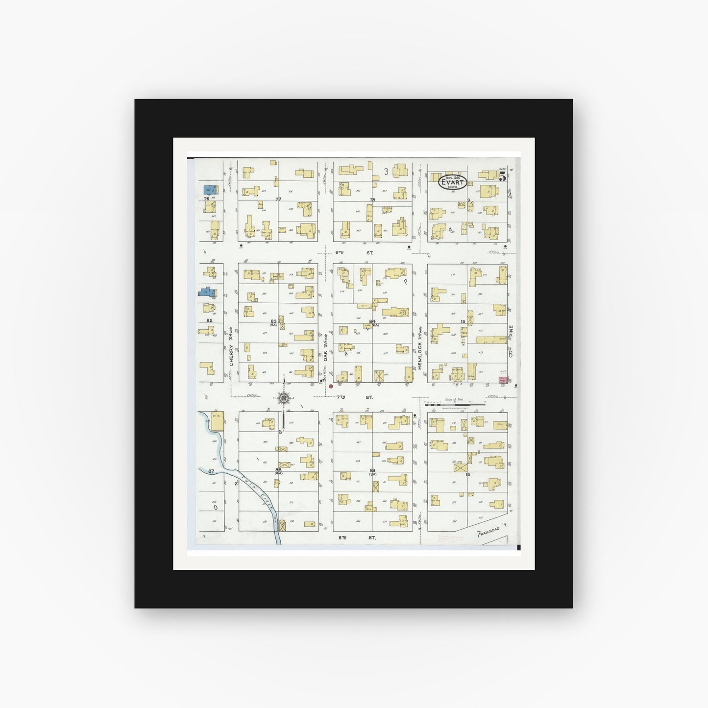 Old map wall art mockup — black gallery frame with white mat — Sanborn Fire Insurance Map from Evart, Osceola County, Michigan (1920), Sheet #0005