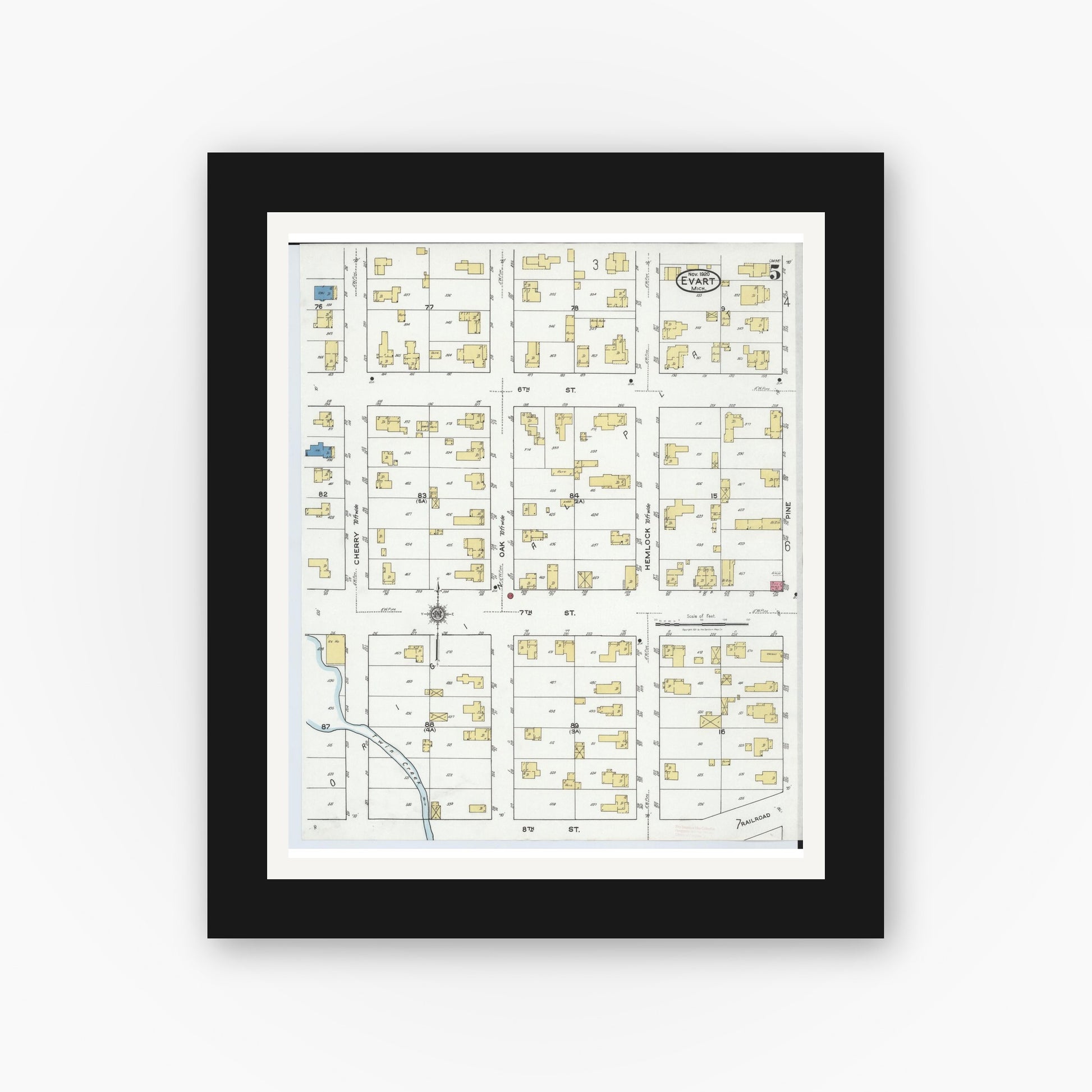 Old map wall art mockup — black gallery frame with white mat — Sanborn Fire Insurance Map from Evart, Osceola County, Michigan (1920), Sheet #0005