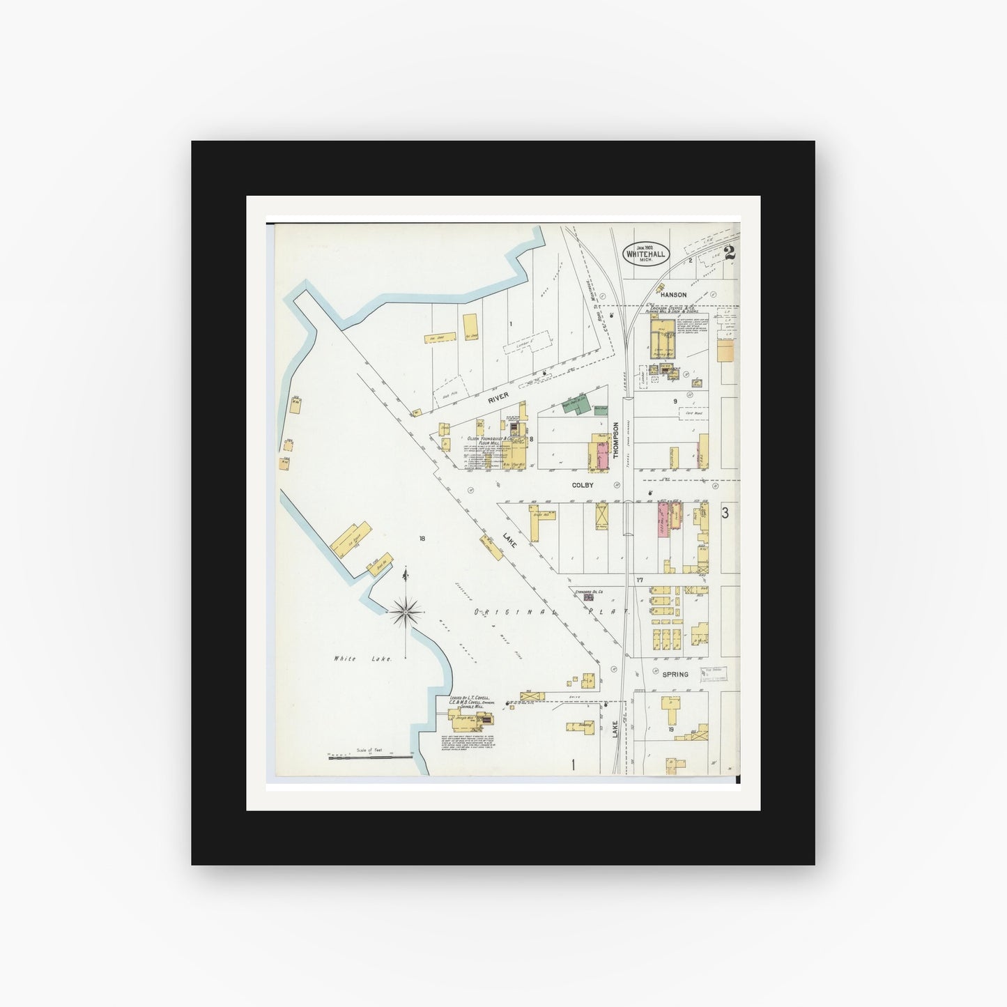 Old map wall art mockup — black gallery frame with white mat — Sanborn Fire Insurance Map from Whitehall, Muskegon County, Michigan (1902), Sheet #0002