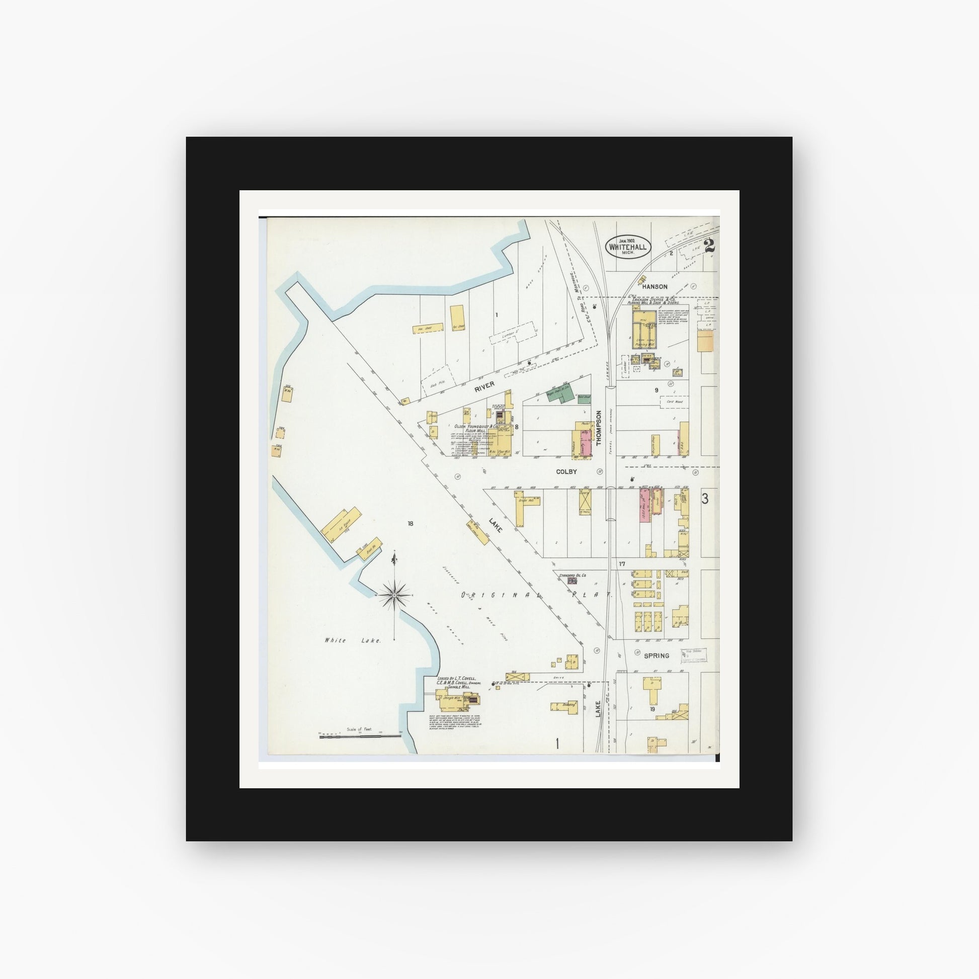 Old map wall art mockup — black gallery frame with white mat — Sanborn Fire Insurance Map from Whitehall, Muskegon County, Michigan (1902), Sheet #0002