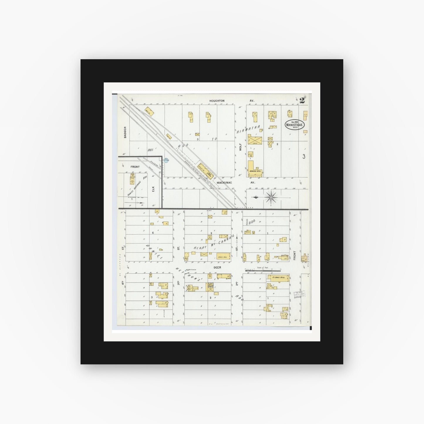Old map wall art mockup — black gallery frame with white mat — Sanborn Fire Insurance Map from Manistique, Schoolcraft County, Michigan (1900), Sheet #0002