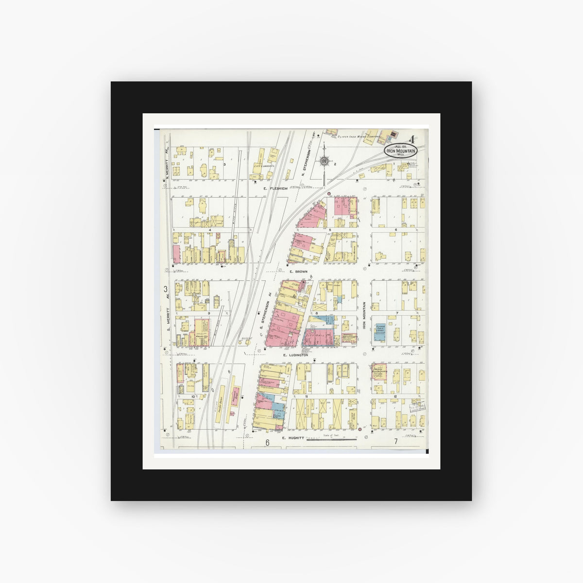 Old map wall art mockup — black gallery frame with white mat — Sanborn Fire Insurance Map from Iron Mountain, Dickinson County, Michigan (1911), Sheet #0004