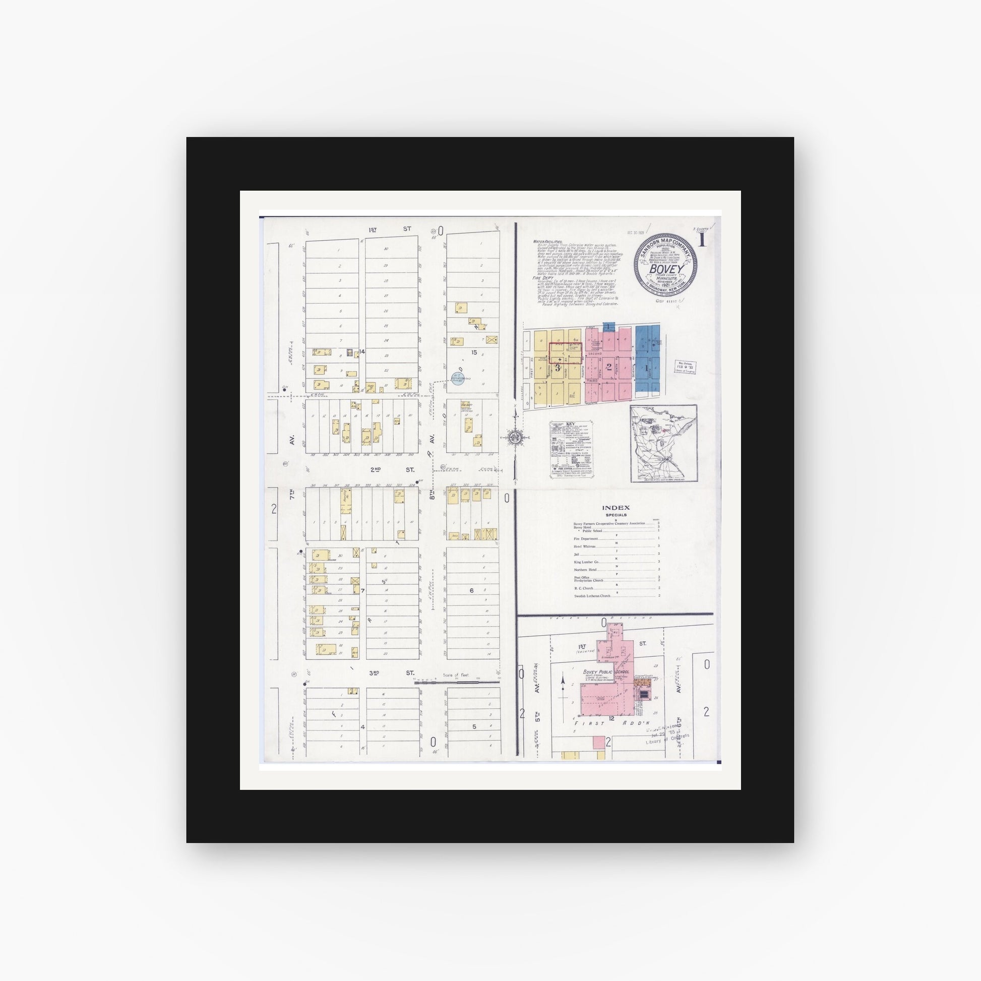 Old map wall art mockup — black gallery frame with white mat — Sanborn Fire Insurance Map from Bovey, Itasca County, Minnesota (1921), Sheet #0001