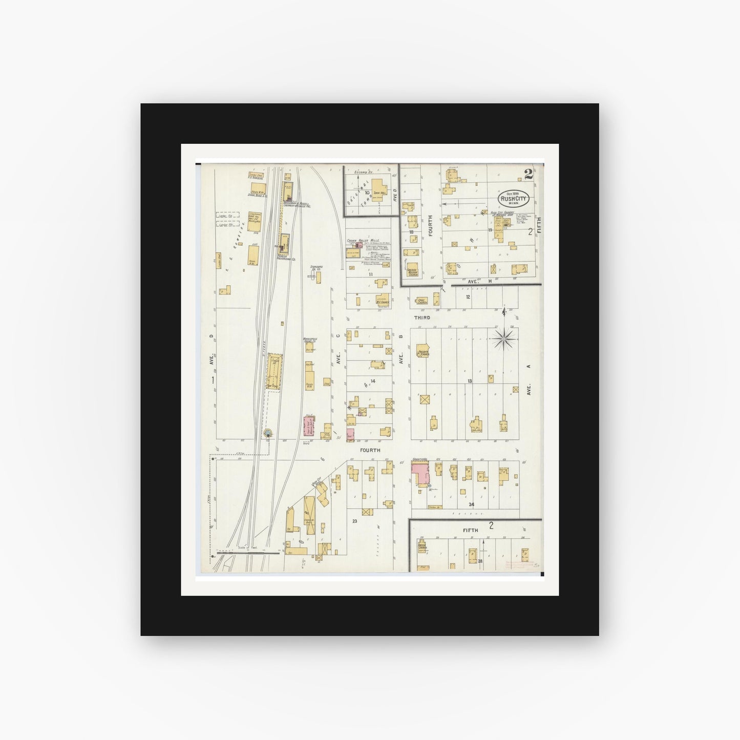 Old map wall art mockup — black gallery frame with white mat — Sanborn Fire Insurance Map from Rush City, Chisago County, Minnesota (1899), Sheet #0002