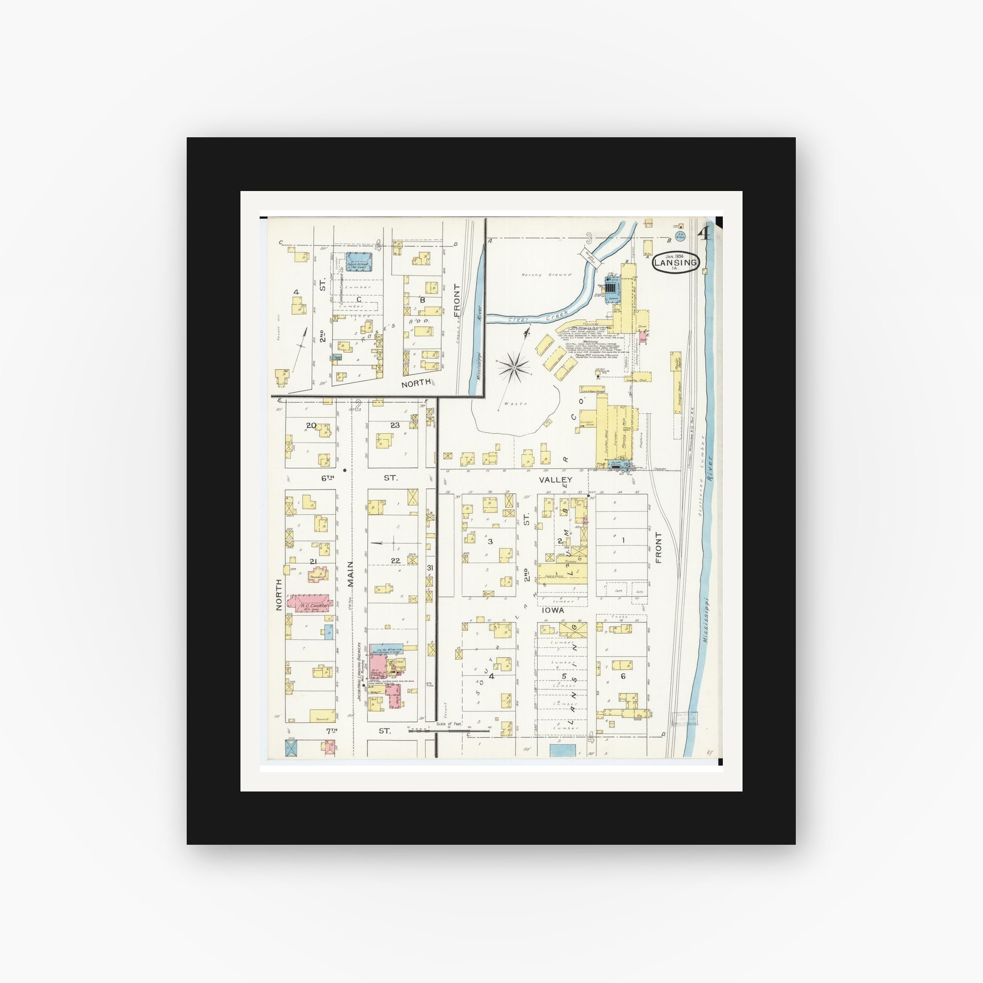 Old map wall art mockup — black gallery frame with white mat — Sanborn Fire Insurance Map from Lansing, Allamakee County, Iowa (1894), Sheet #0004