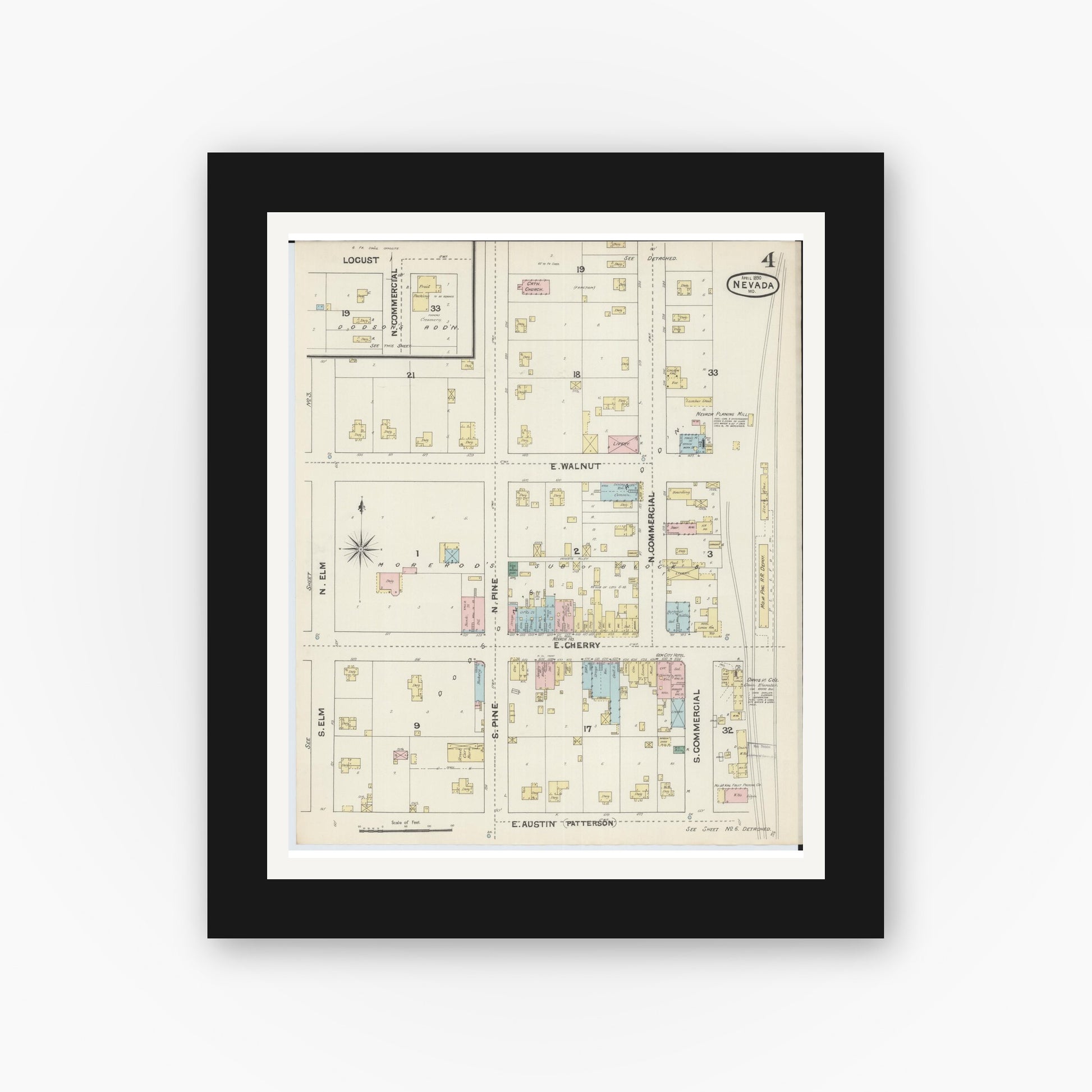 Old map wall art mockup — black gallery frame with white mat — Sanborn Fire Insurance Map from Nevada, Vernon County, Missouri (1890), Sheet #0004
