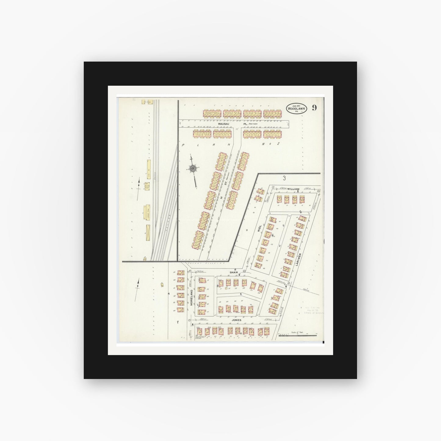 Old map wall art mockup — black gallery frame with white mat — Sanborn Fire Insurance Map from Woodlawn, Beaver County, Pennsylvania (1911), Sheet #0009