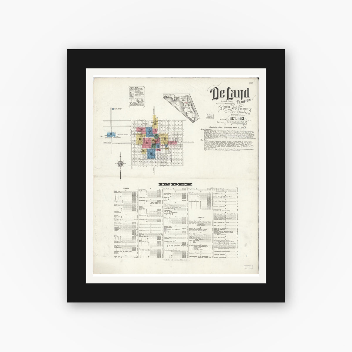 Old map wall art mockup — black gallery frame with white mat — Sanborn Fire Insurance Map from De Land, Volusia County, Florida (1921), Sheet #0001