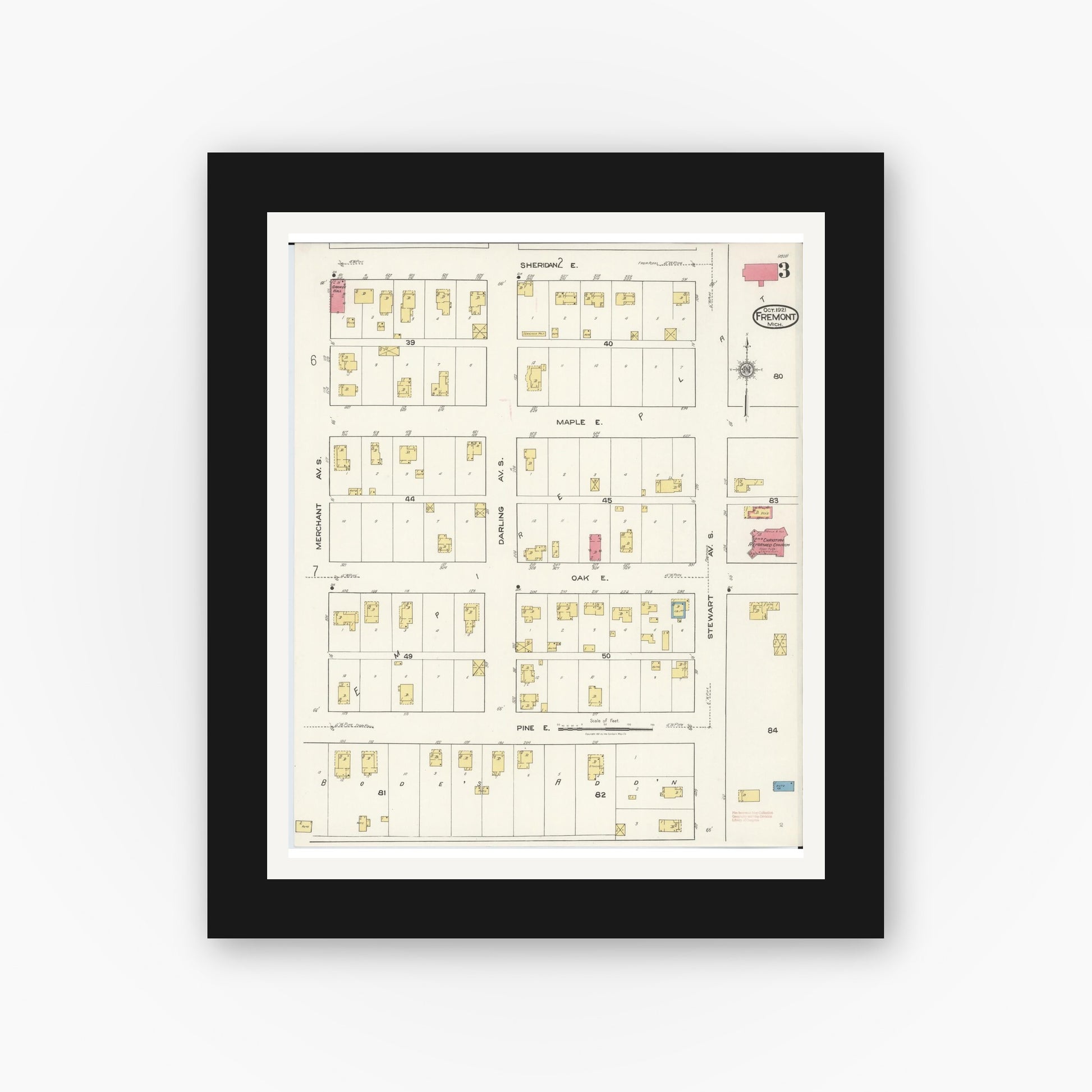Old map wall art mockup — black gallery frame with white mat — Sanborn Fire Insurance Map from Fremont, Newaygo County, Michigan (1921), Sheet #0003