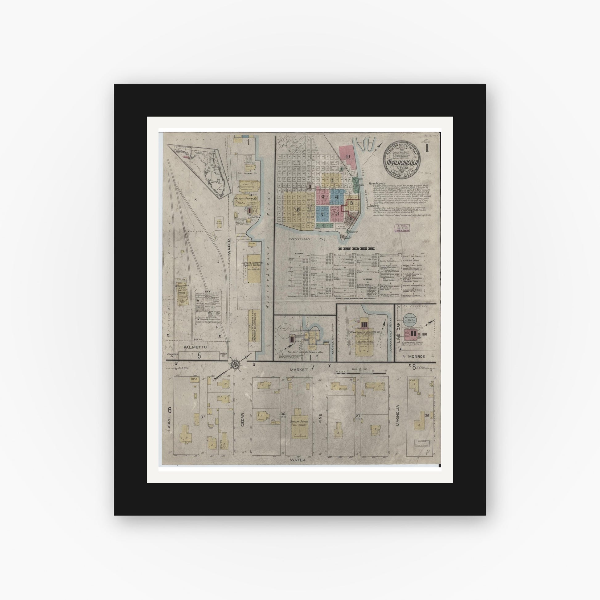 Old map wall art mockup — black gallery frame with white mat — Sanborn Fire Insurance Map from Apalachicola, Franklin County, Florida (1913), Sheet #0001