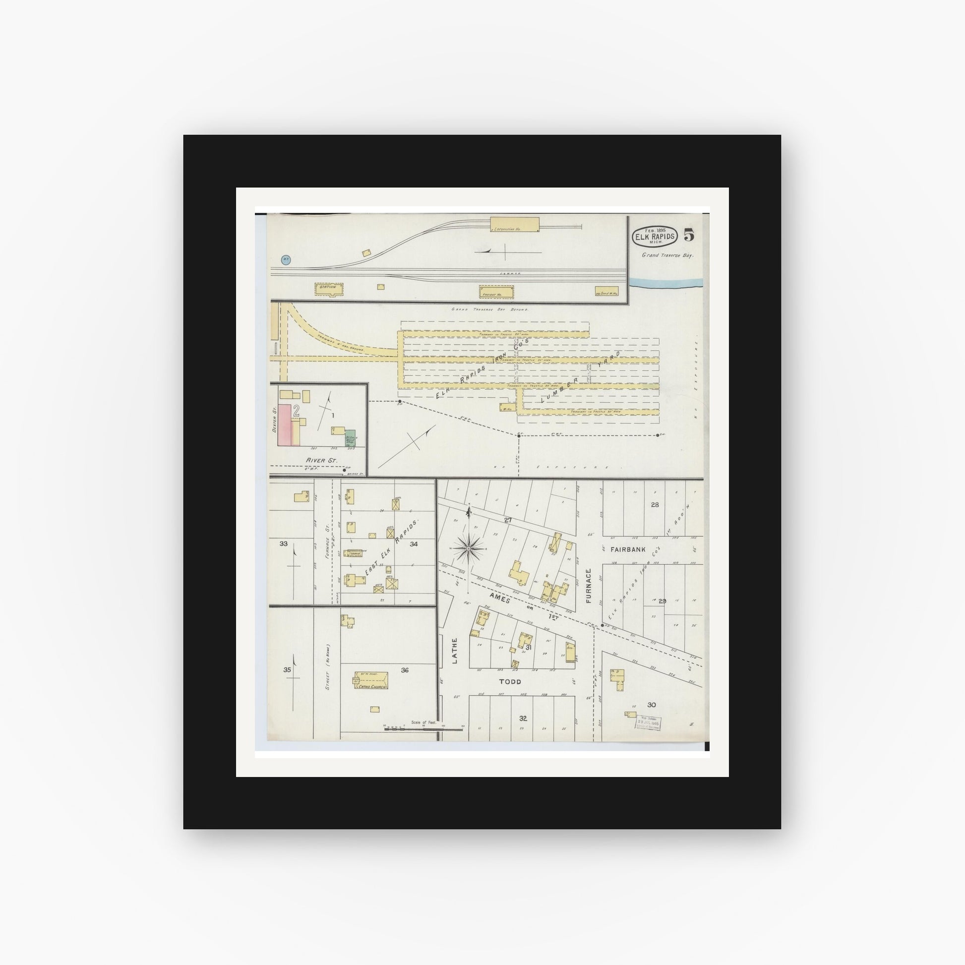 Old map wall art mockup — black gallery frame with white mat — Sanborn Fire Insurance Map from Elk Rapids, Antrim County, Michigan (1895), Sheet #0005