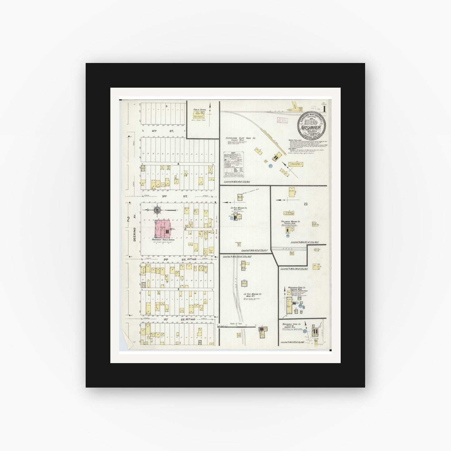 Old map wall art mockup — black gallery frame with white mat — Sanborn Fire Insurance Map from Nashwauk, Itasca County, Minnesota (1909), Sheet #0001