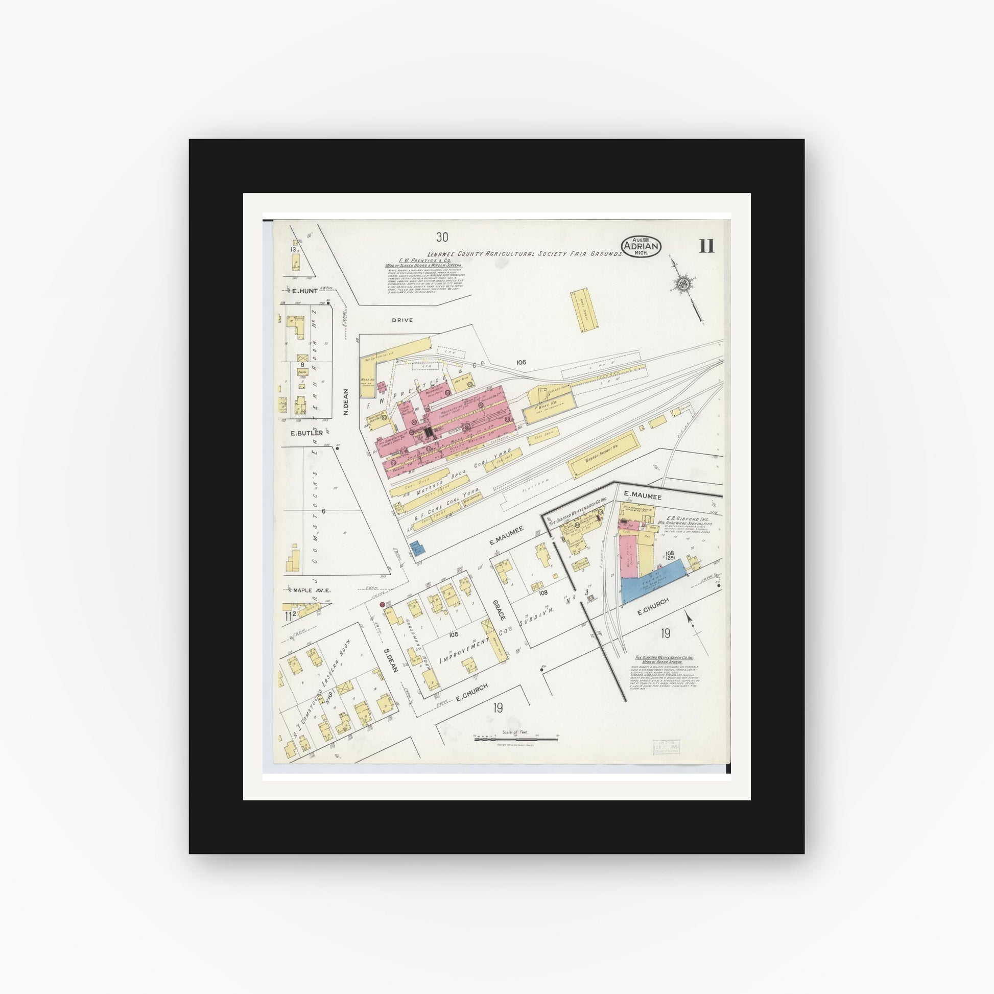 Old map wall art mockup — black gallery frame with white mat — Sanborn Fire Insurance Map from Adrian, Lenawee County, Michigan (1916), Sheet #0011