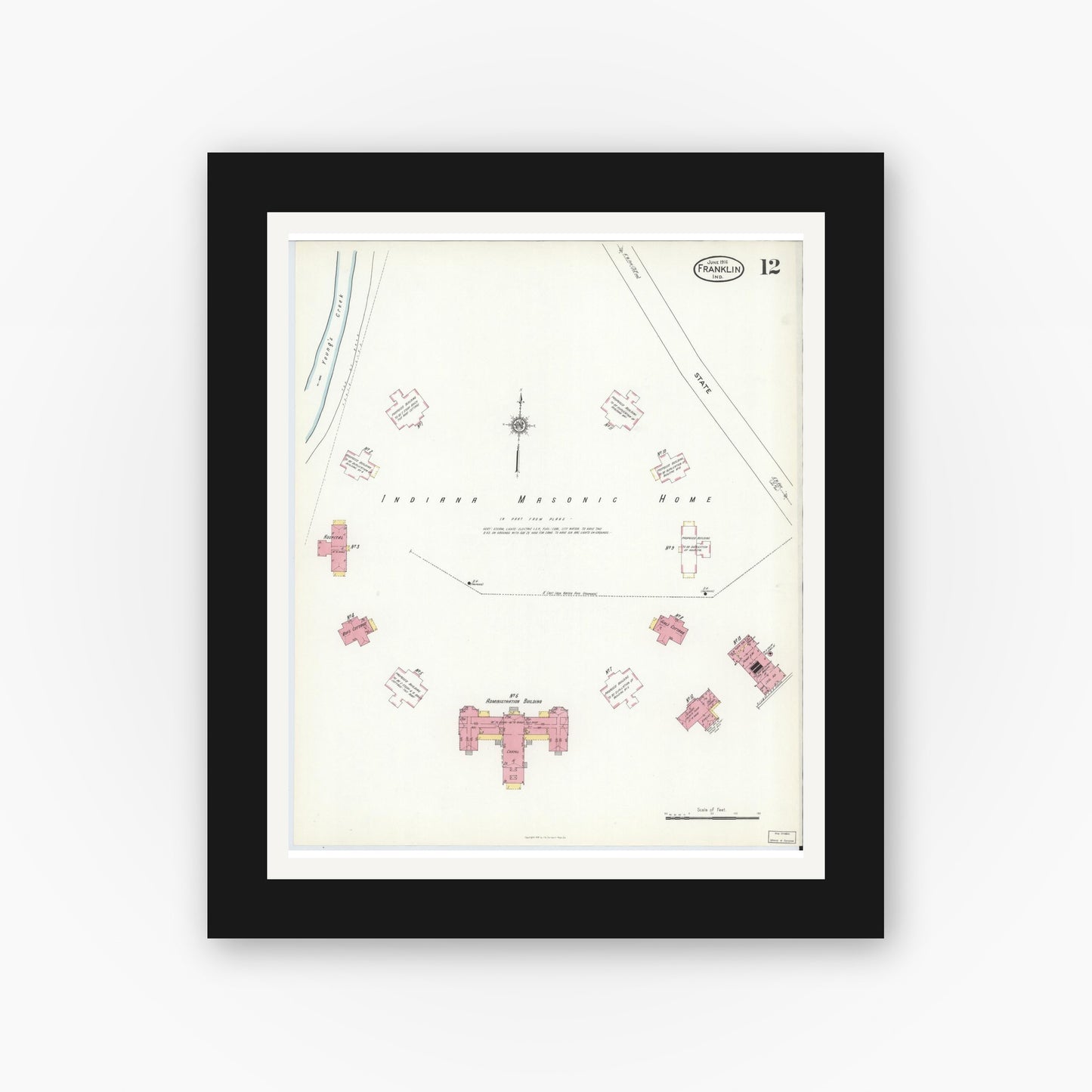 Old map wall art mockup — black gallery frame with white mat — Sanborn Fire Insurance Map from Franklin, Johnson County, Indiana (1916), Sheet #0012