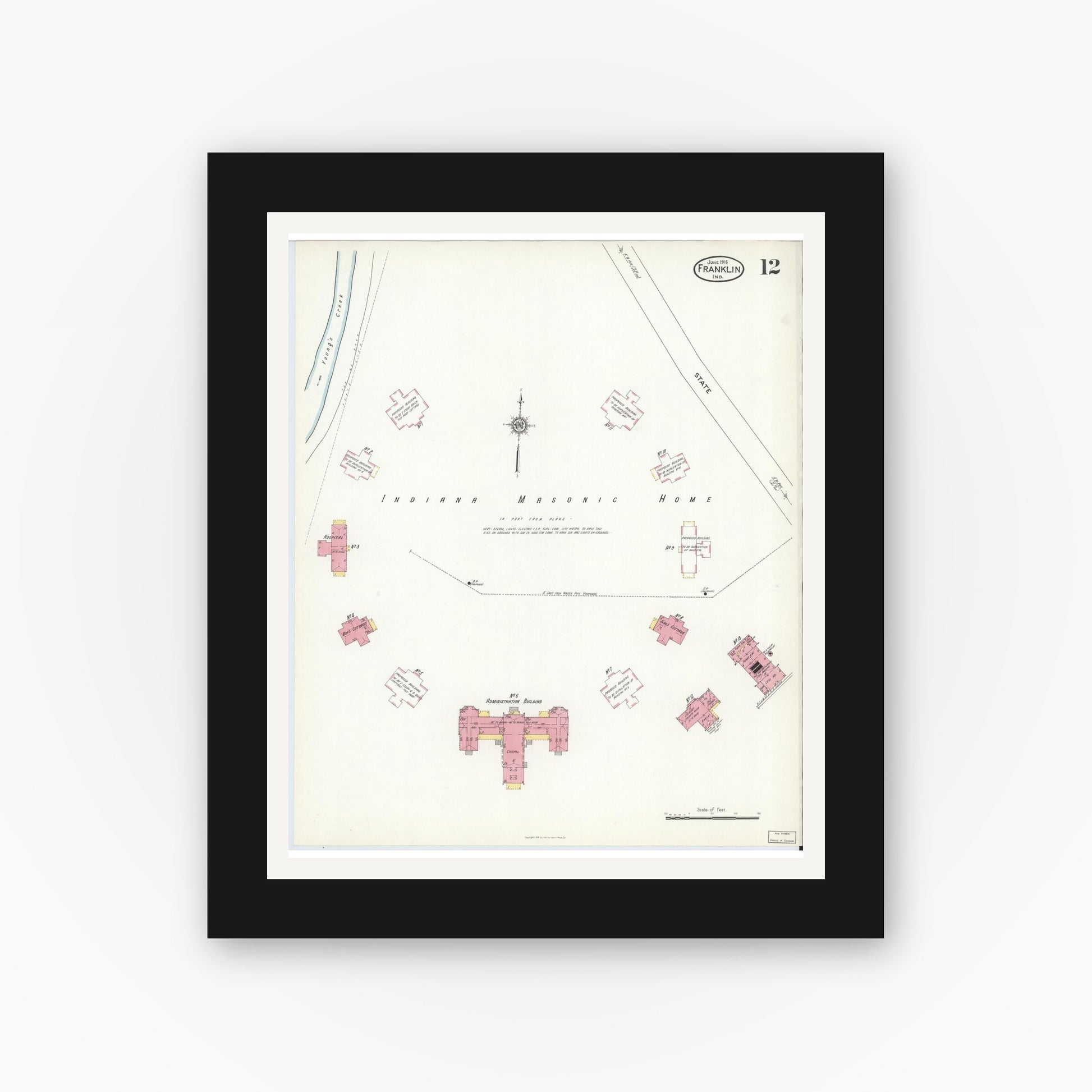 Old map wall art mockup — black gallery frame with white mat — Sanborn Fire Insurance Map from Franklin, Johnson County, Indiana (1916), Sheet #0012