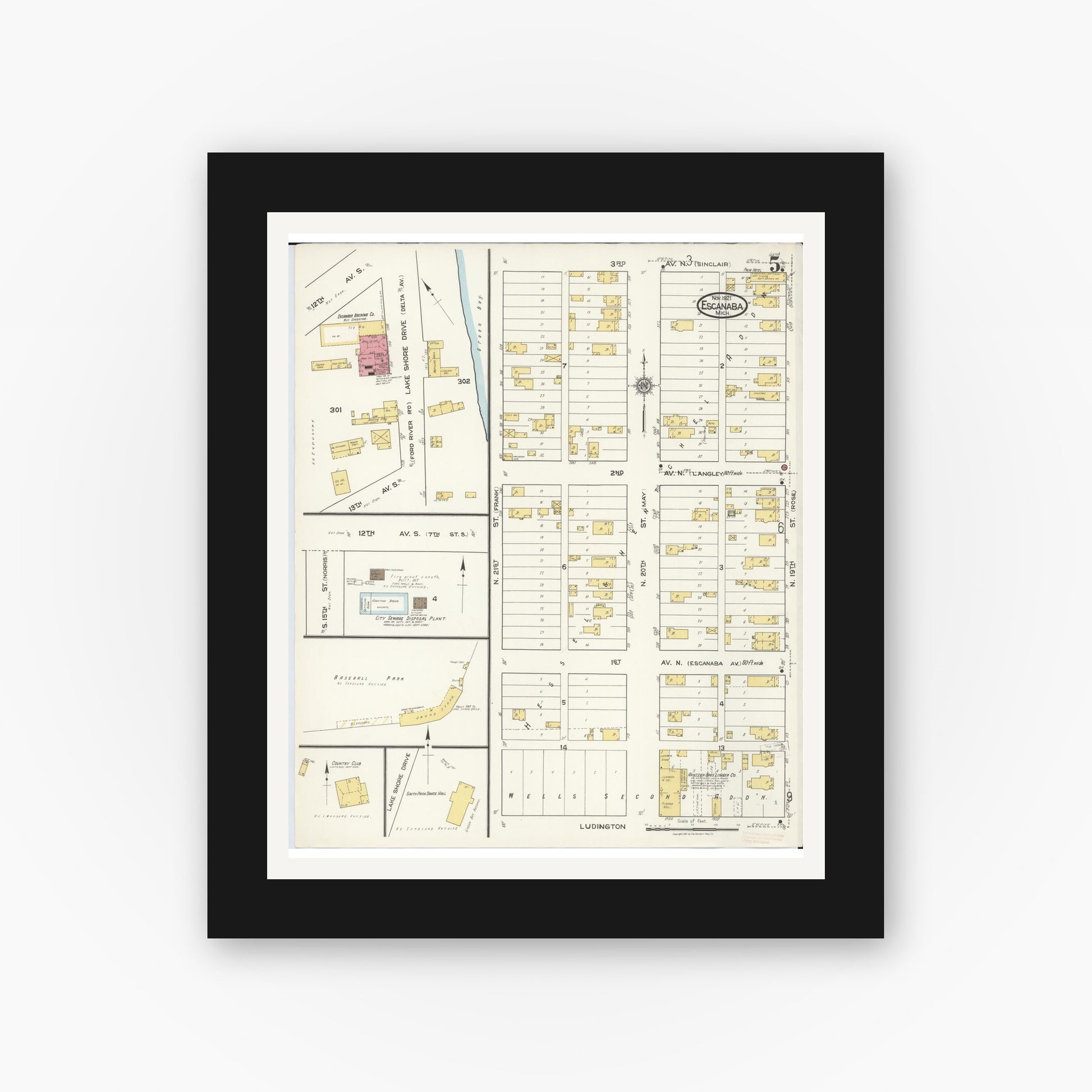 Old map wall art mockup — black gallery frame with white mat — Sanborn Fire Insurance Map from Escanaba, Delta County, Michigan (1921), Sheet #0005