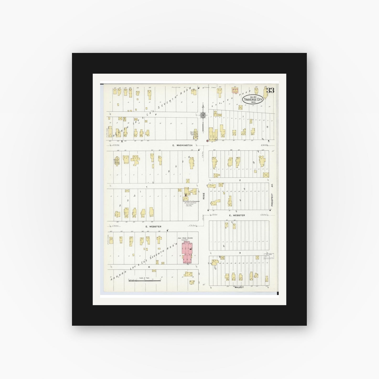 Old map wall art mockup — black gallery frame with white mat — Sanborn Fire Insurance Map from Traverse City, Grand Traverse County, Michigan (1910), Sheet #0033