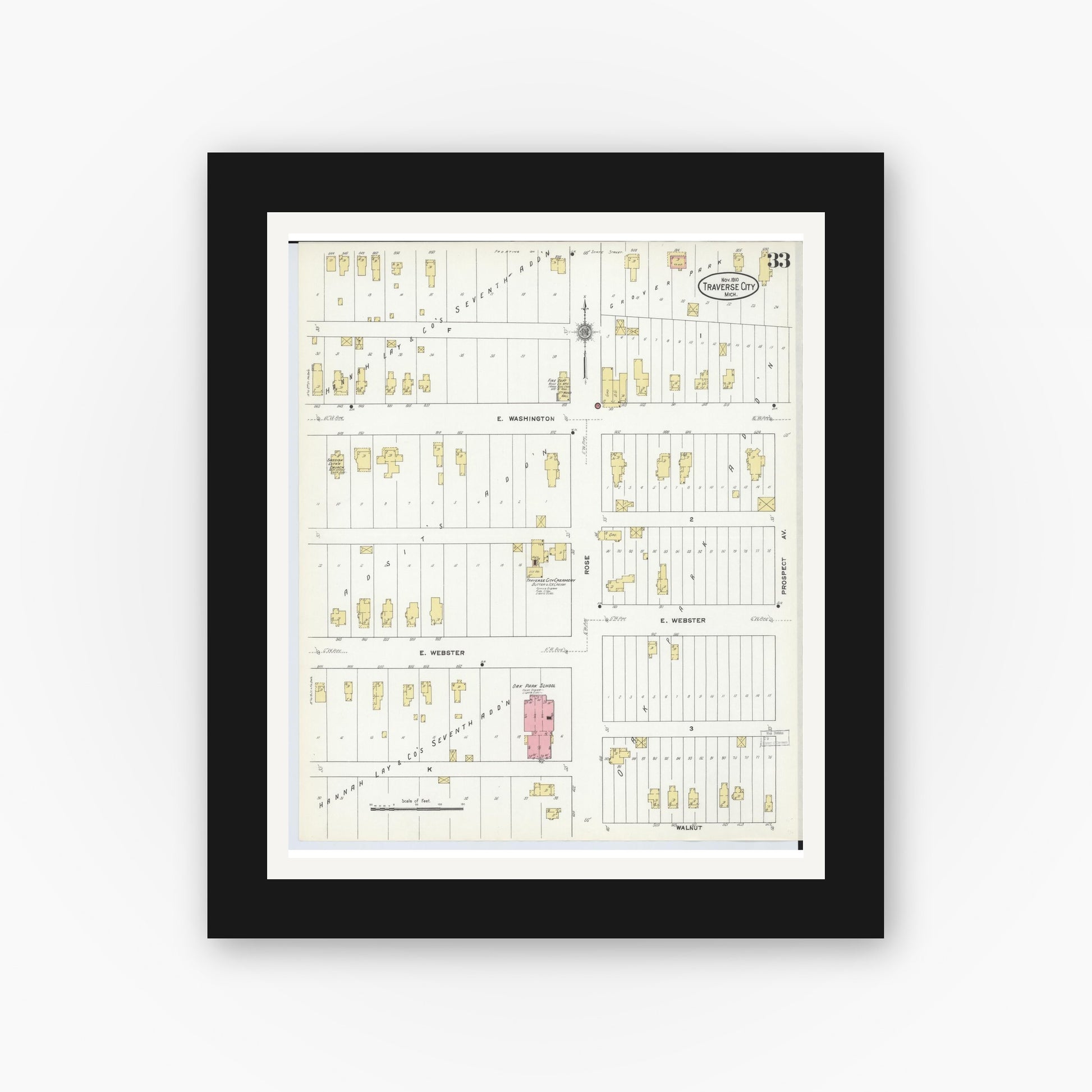 Old map wall art mockup — black gallery frame with white mat — Sanborn Fire Insurance Map from Traverse City, Grand Traverse County, Michigan (1910), Sheet #0033