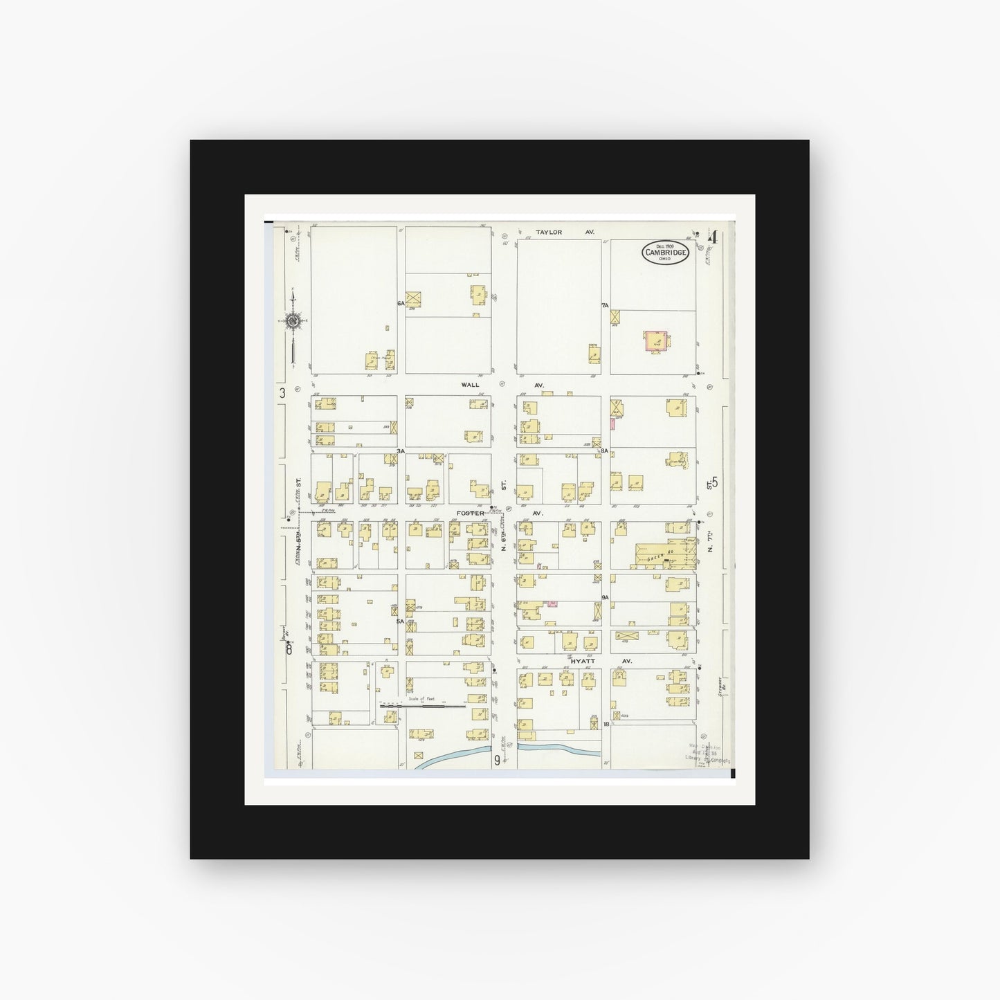 Old map wall art mockup — black gallery frame with white mat — Sanborn Fire Insurance Map from Cambridge, Guernsey County, Ohio (1909), Sheet #0004