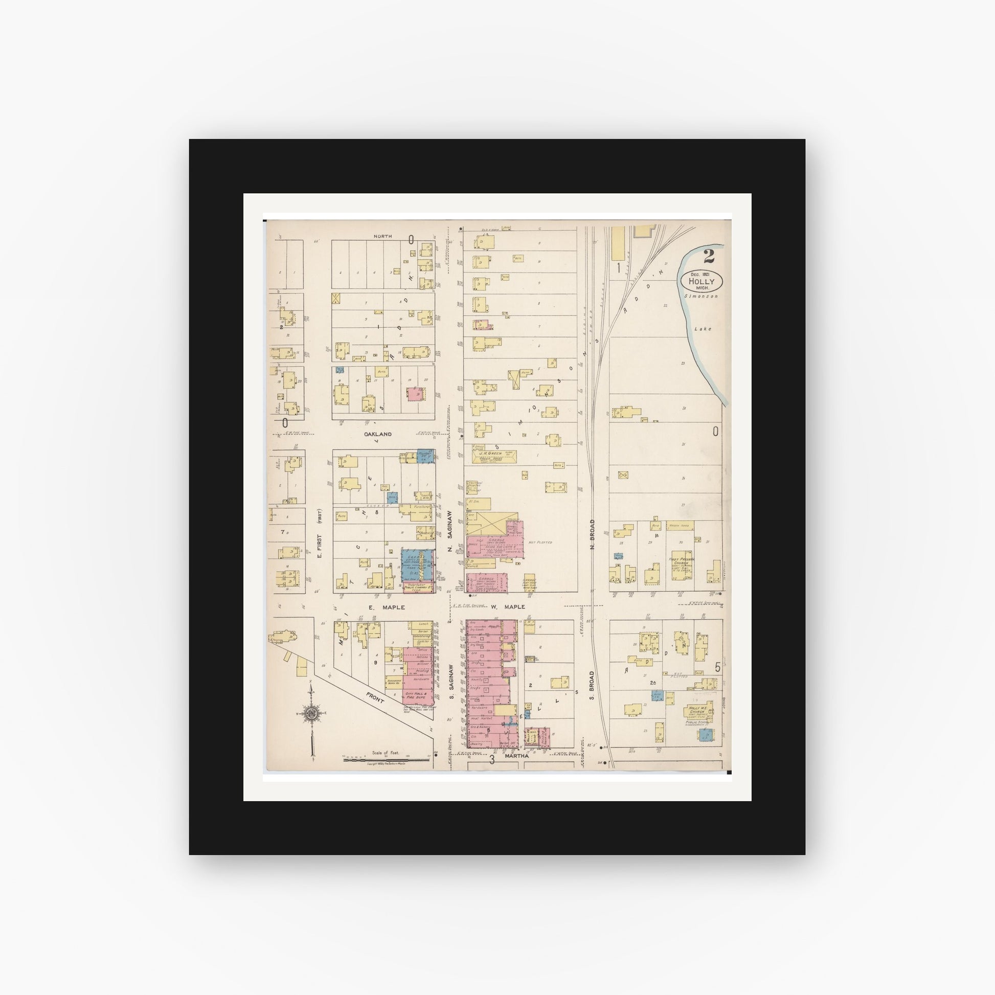 Old map wall art mockup — black gallery frame with white mat — Sanborn Fire Insurance Map from Holly, Oakland County, Michigan (1921), Sheet #0002