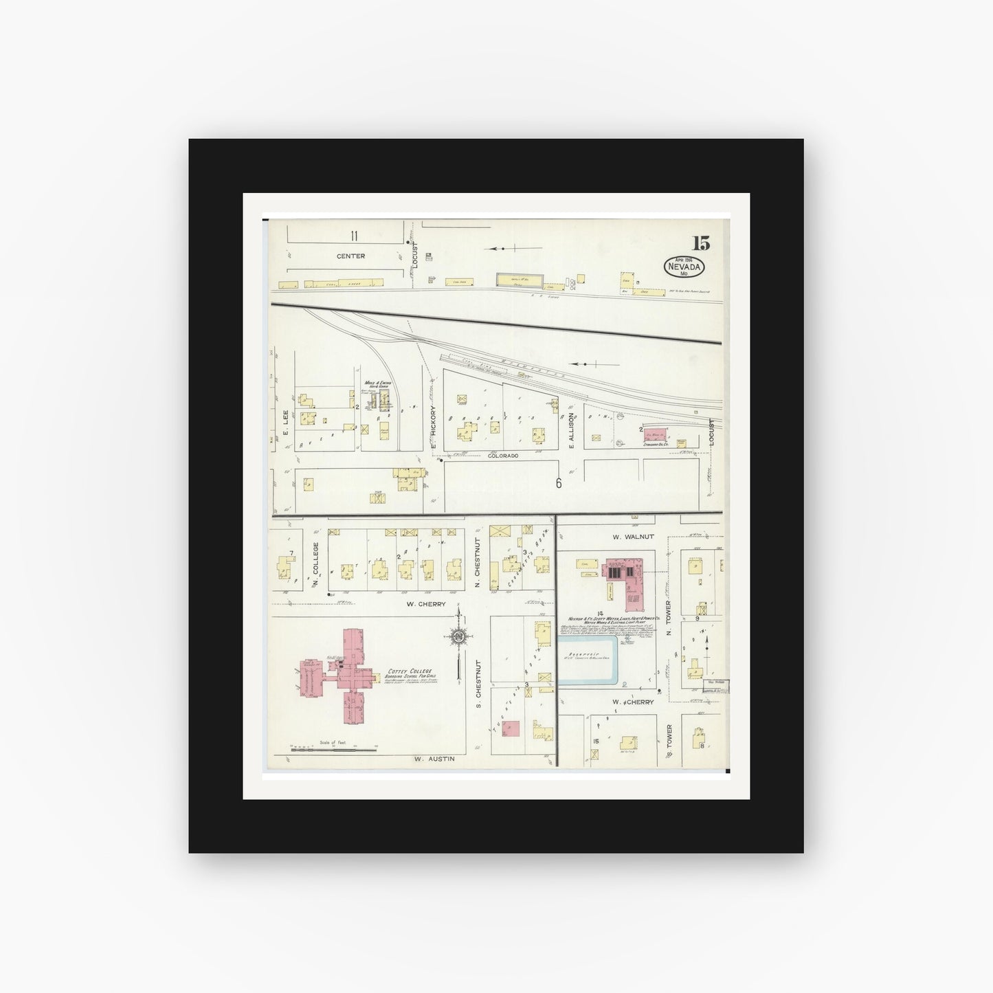 Old map wall art mockup — black gallery frame with white mat — Sanborn Fire Insurance Map from Nevada, Vernon County, Missouri (1914), Sheet #0015