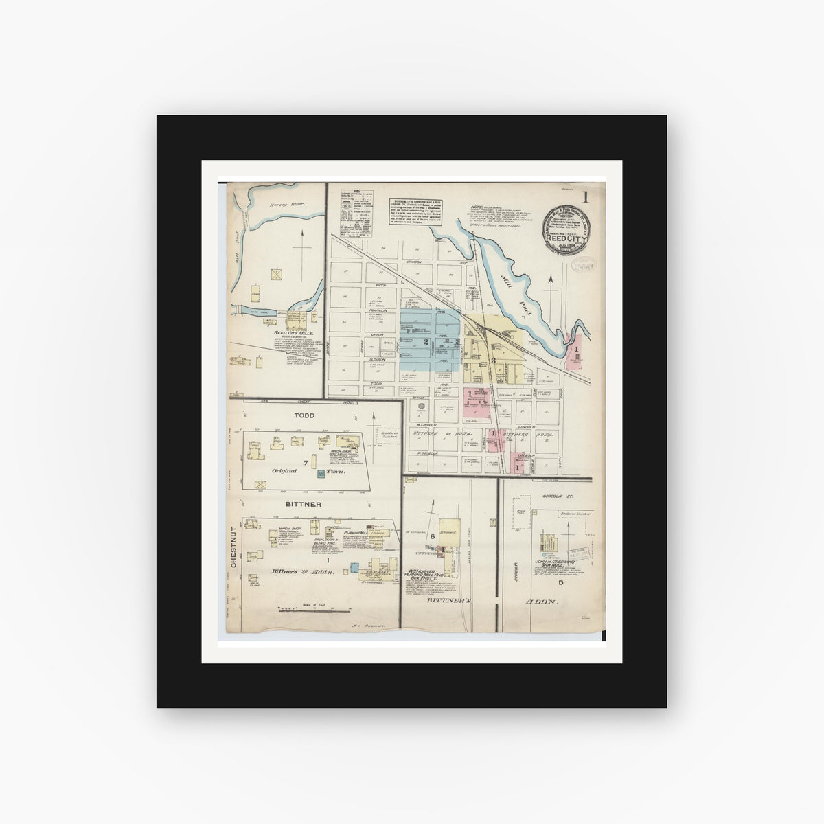 Old map wall art mockup — black gallery frame with white mat — Sanborn Fire Insurance Map from Reed City, Osceola County, Michigan (1884), Sheet #0001