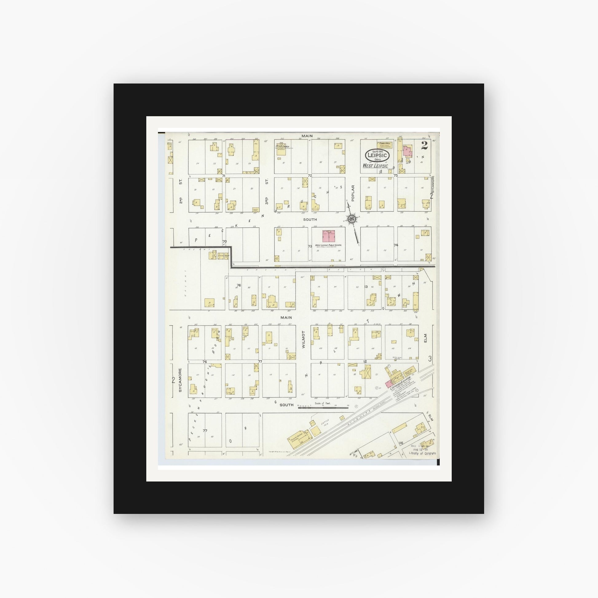 Old map wall art mockup — black gallery frame with white mat — Sanborn Fire Insurance Map from Leipsic, Putnam County, Ohio (1916), Sheet #0002