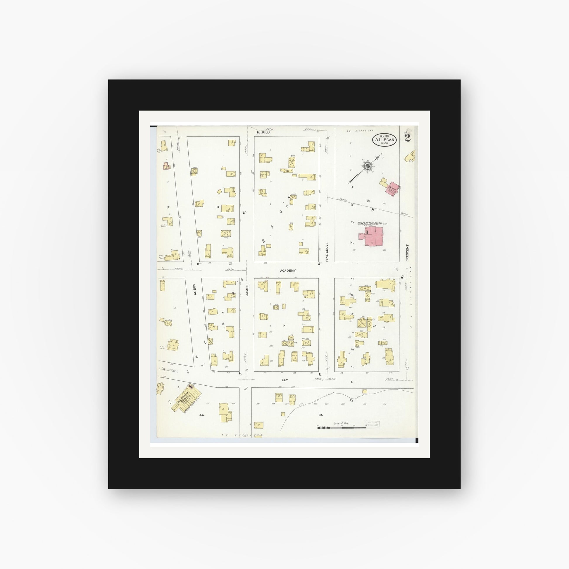Old map wall art mockup — black gallery frame with white mat — Sanborn Fire Insurance Map from Allegan, Allegan County, Michigan (1911), Sheet #0002