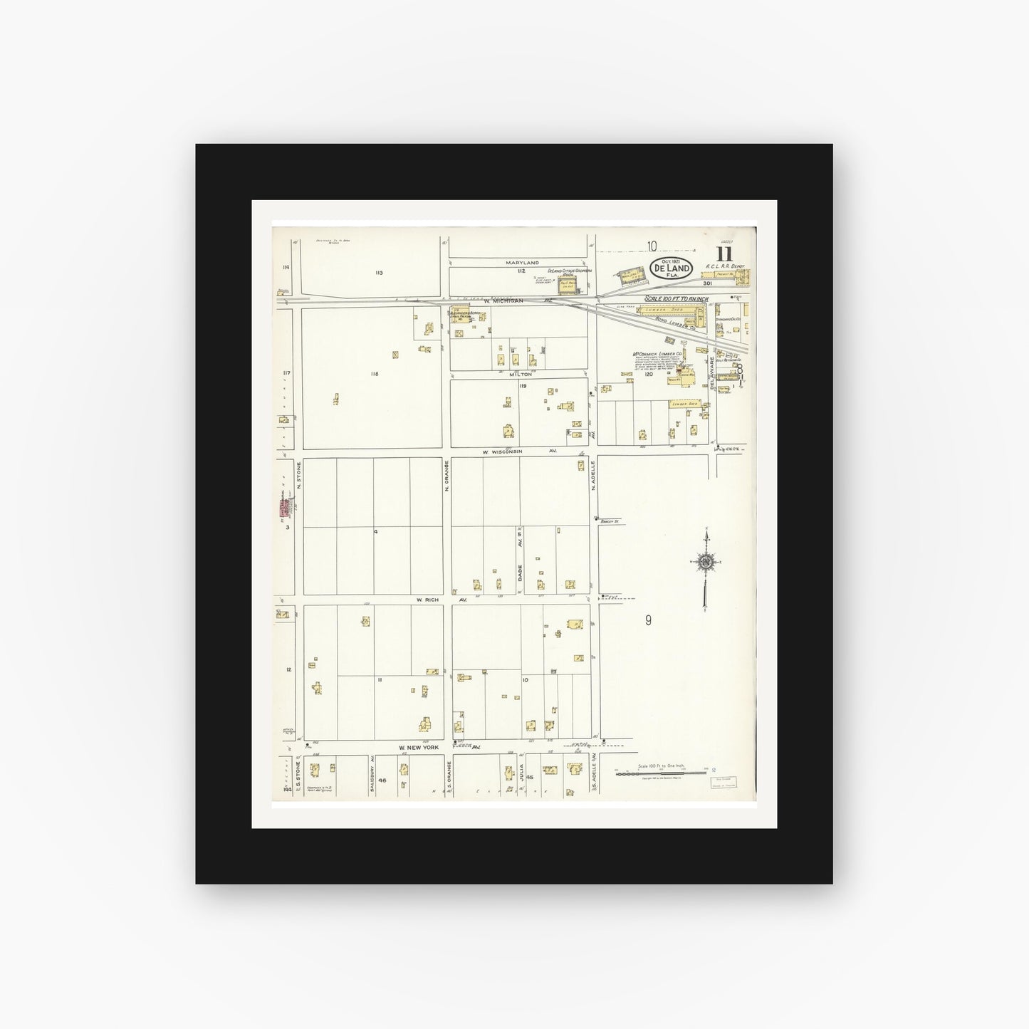 Old map wall art mockup — black gallery frame with white mat — Sanborn Fire Insurance Map from De Land, Volusia County, Florida (1921), Sheet #0011