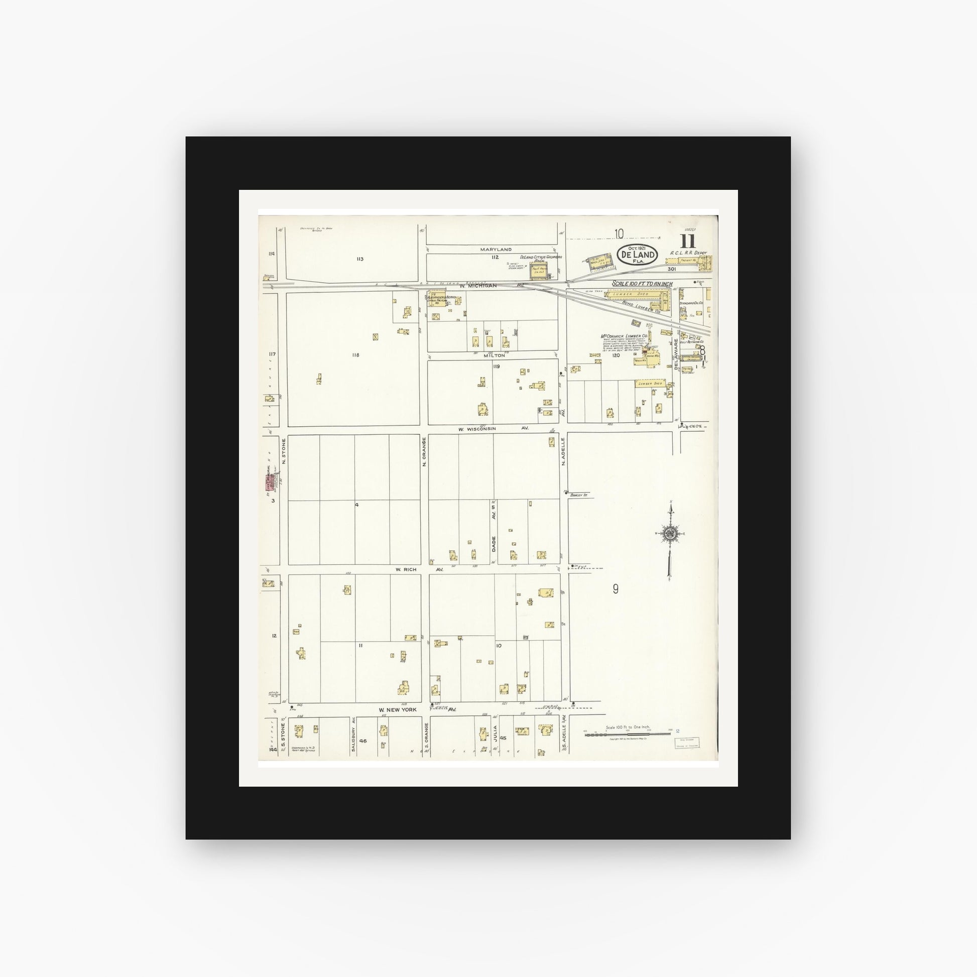 Old map wall art mockup — black gallery frame with white mat — Sanborn Fire Insurance Map from De Land, Volusia County, Florida (1921), Sheet #0011