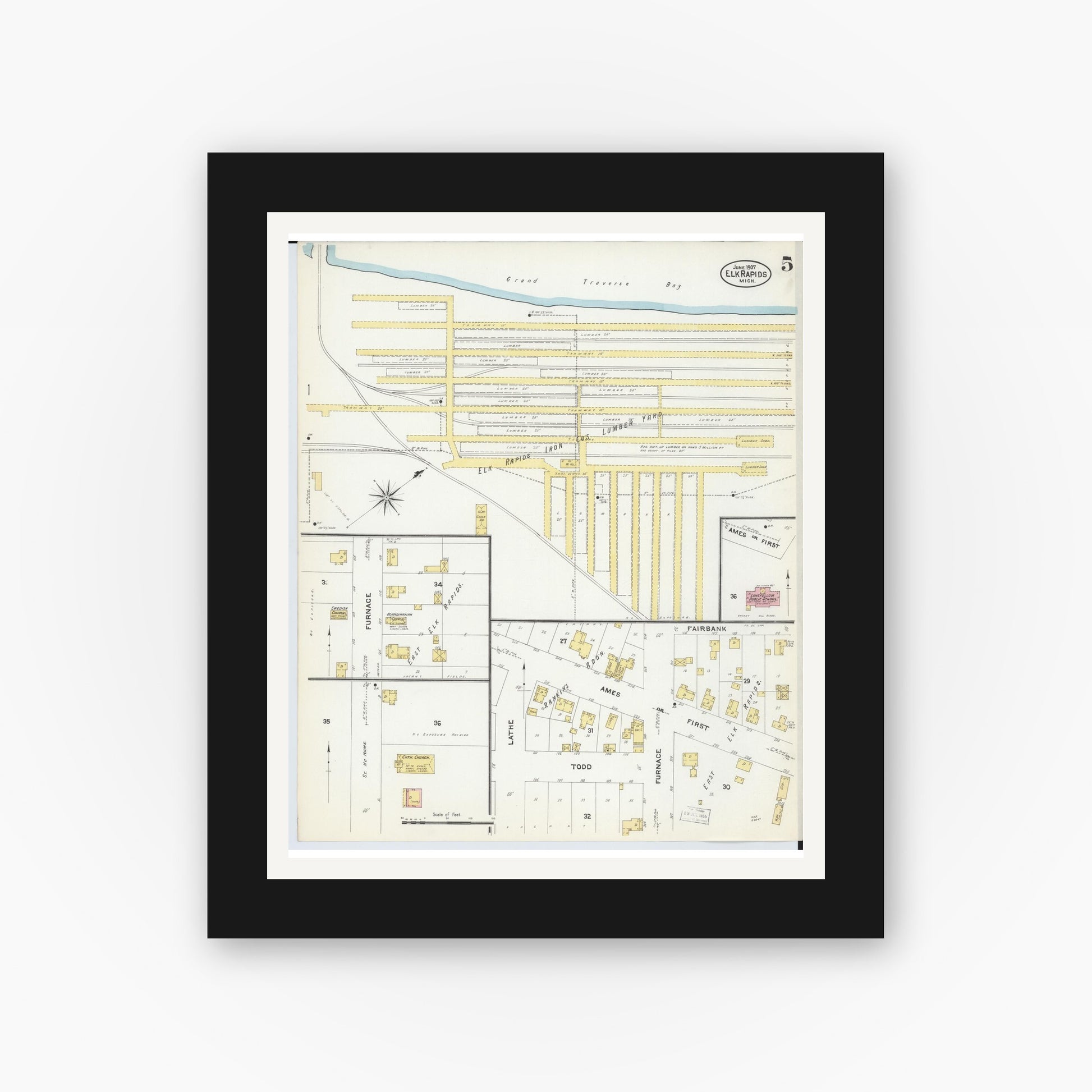 Old map wall art mockup — black gallery frame with white mat — Sanborn Fire Insurance Map from Elk Rapids, Antrim County, Michigan (1907), Sheet #0005