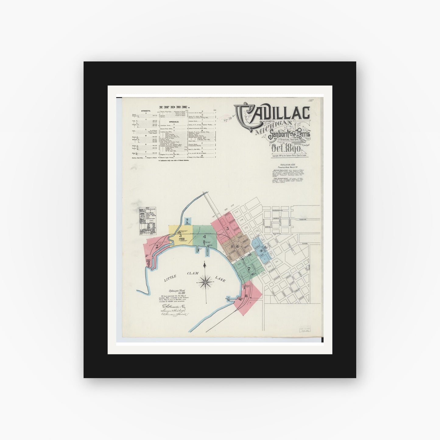 Old map wall art mockup — black gallery frame with white mat — Sanborn Fire Insurance Map from Cadillac, Wexford County, Michigan (1890) - Complete Map Set