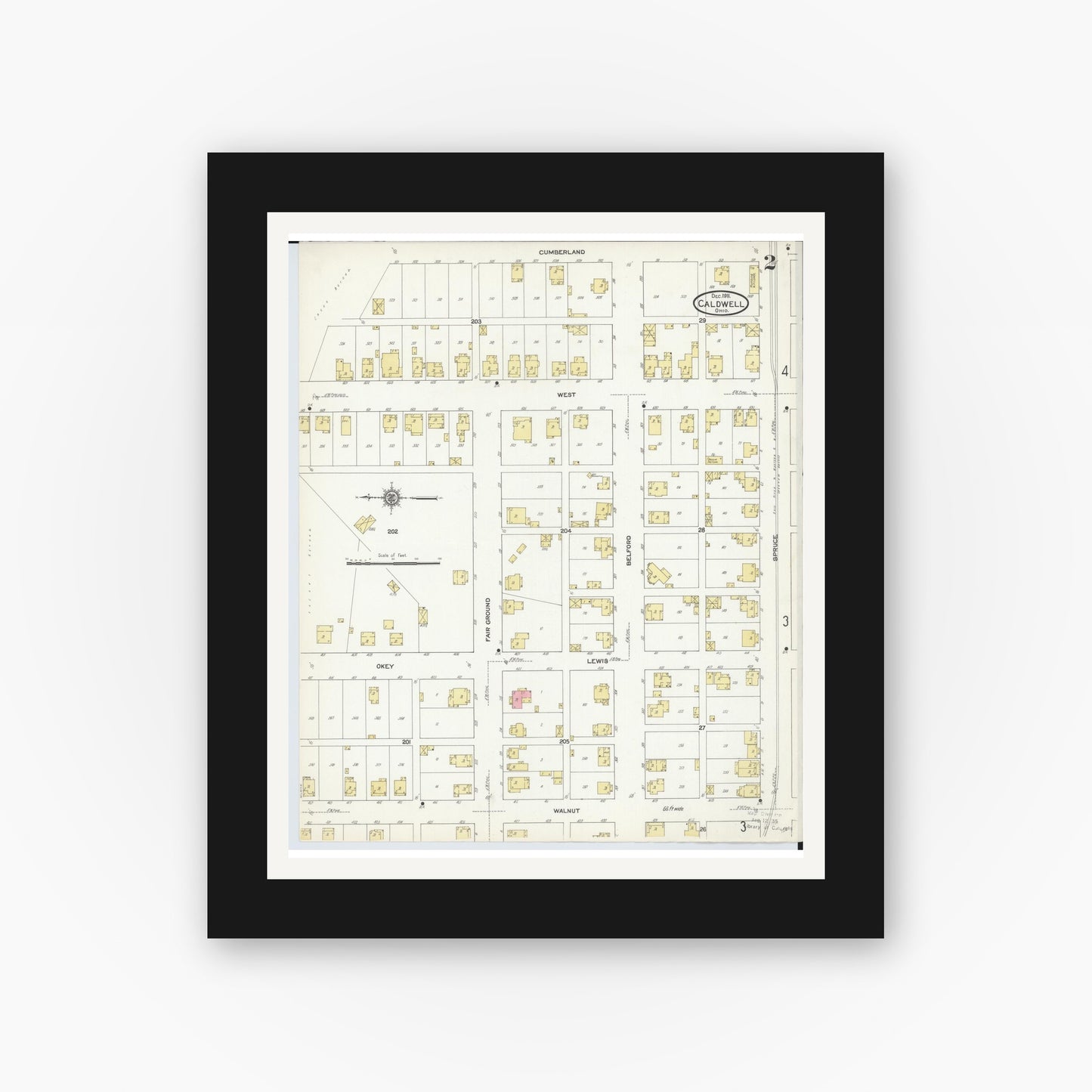 Old map wall art mockup — black gallery frame with white mat — Sanborn Fire Insurance Map from Caldwell, Noble County, Ohio (1911), Sheet #0002