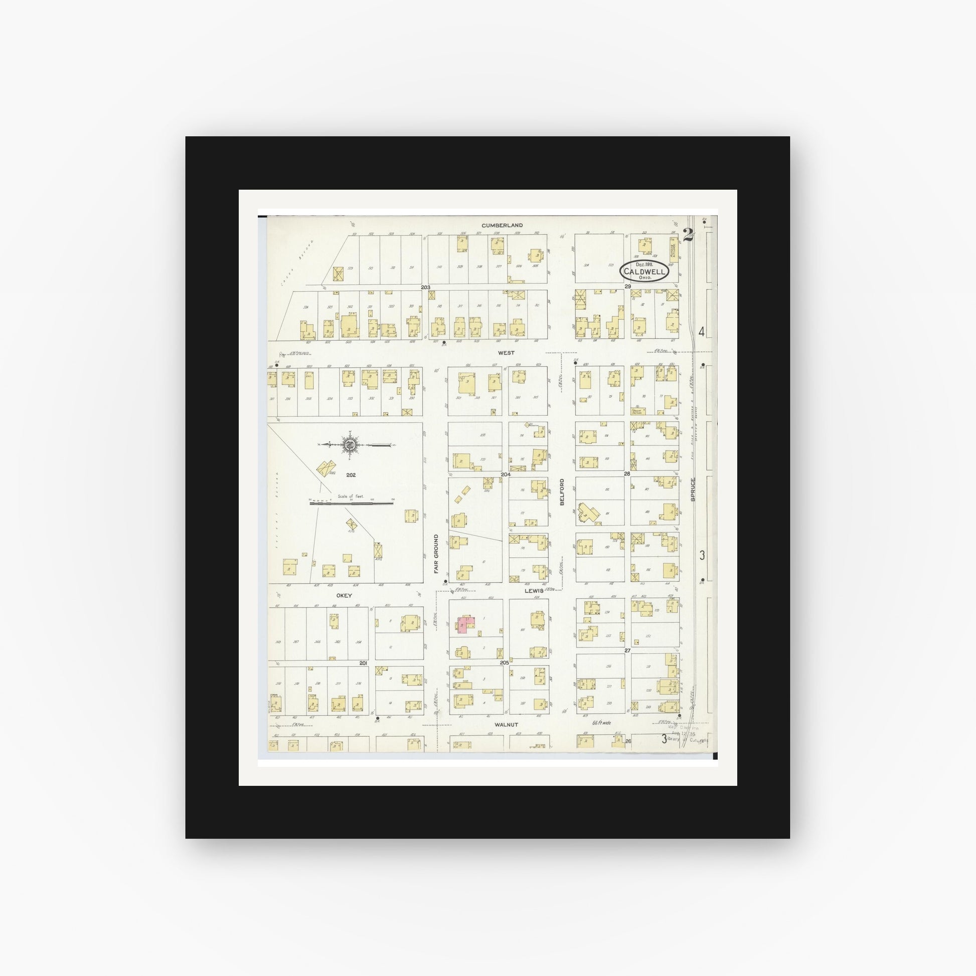 Old map wall art mockup — black gallery frame with white mat — Sanborn Fire Insurance Map from Caldwell, Noble County, Ohio (1911), Sheet #0002
