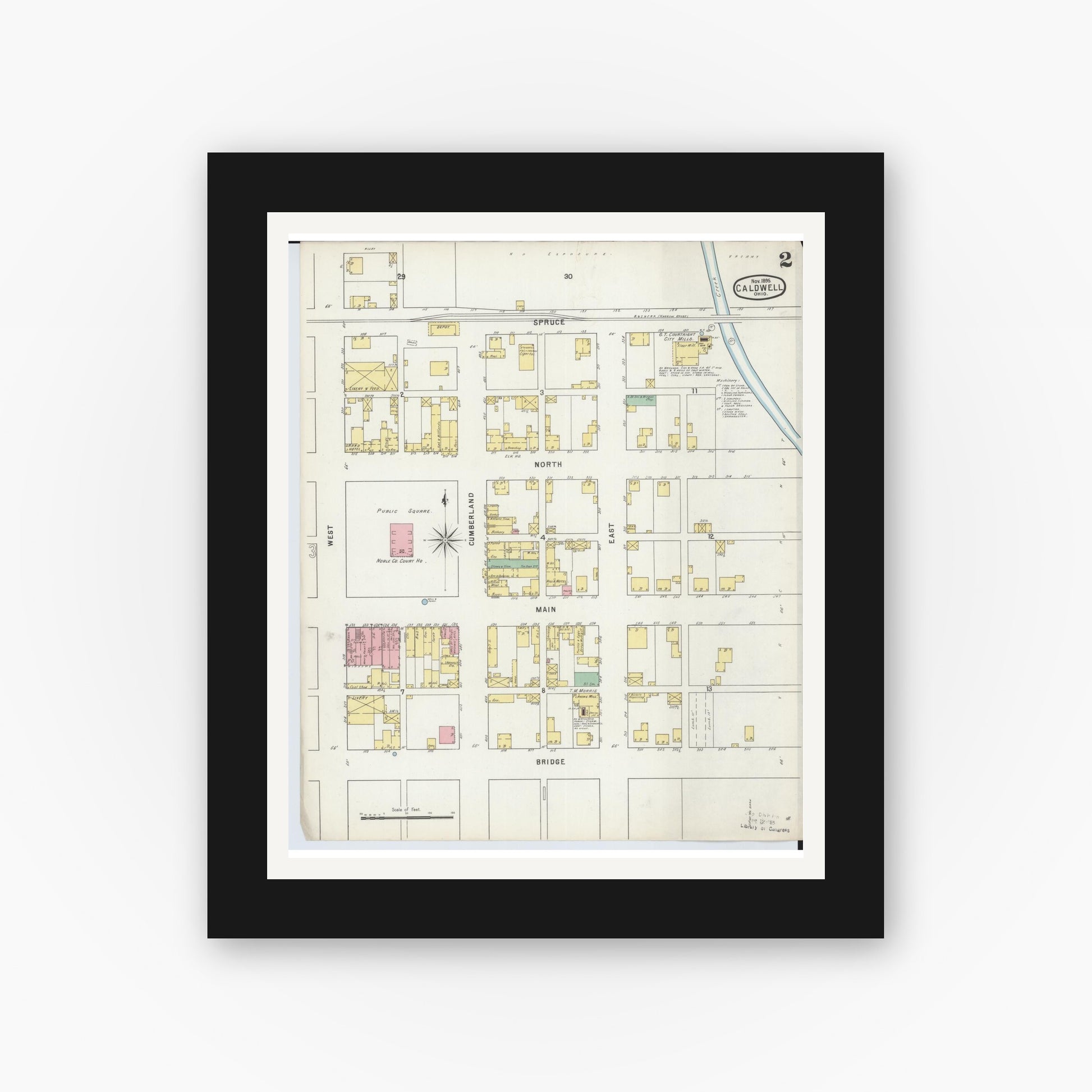 Old map wall art mockup — black gallery frame with white mat — Sanborn Fire Insurance Map from Caldwell, Noble County, Ohio (1895), Sheet #0002