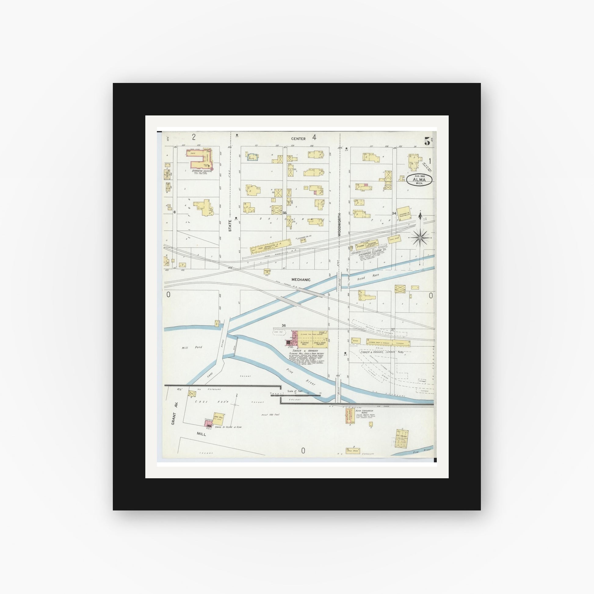 Old map wall art mockup — black gallery frame with white mat — Sanborn Fire Insurance Map from Alma, Gratiot County, Michigan (1902), Sheet #0005