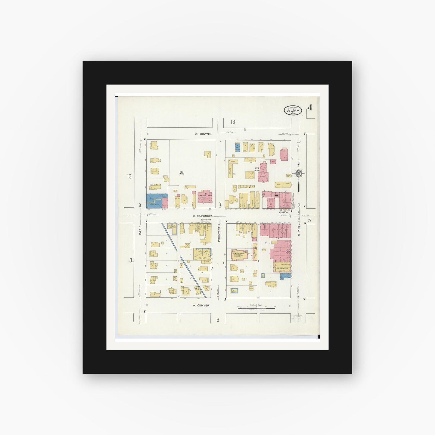 Old map wall art mockup — black gallery frame with white mat — Sanborn Fire Insurance Map from Alma, Gratiot County, Michigan (1917), Sheet #0004