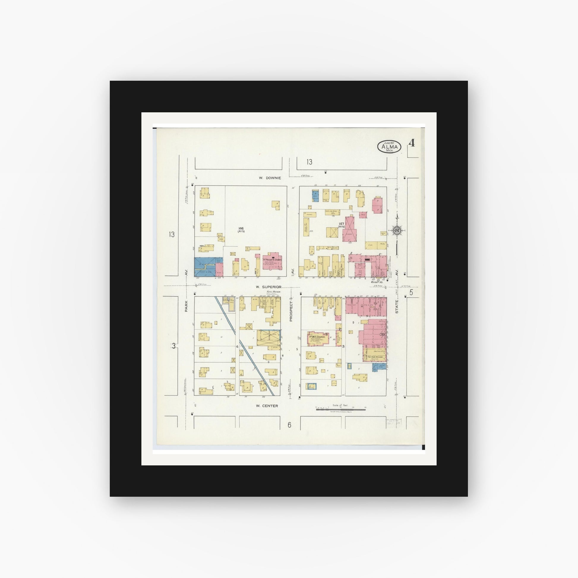 Old map wall art mockup — black gallery frame with white mat — Sanborn Fire Insurance Map from Alma, Gratiot County, Michigan (1917), Sheet #0004