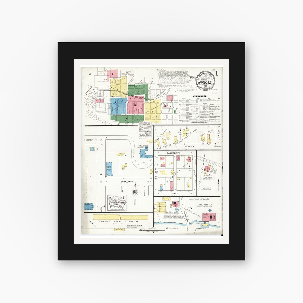 Old map wall art mockup — black gallery frame with white mat — Sanborn Fire Insurance Map from Anamosa, Jones County, Iowa (1917) â€” Complete Set