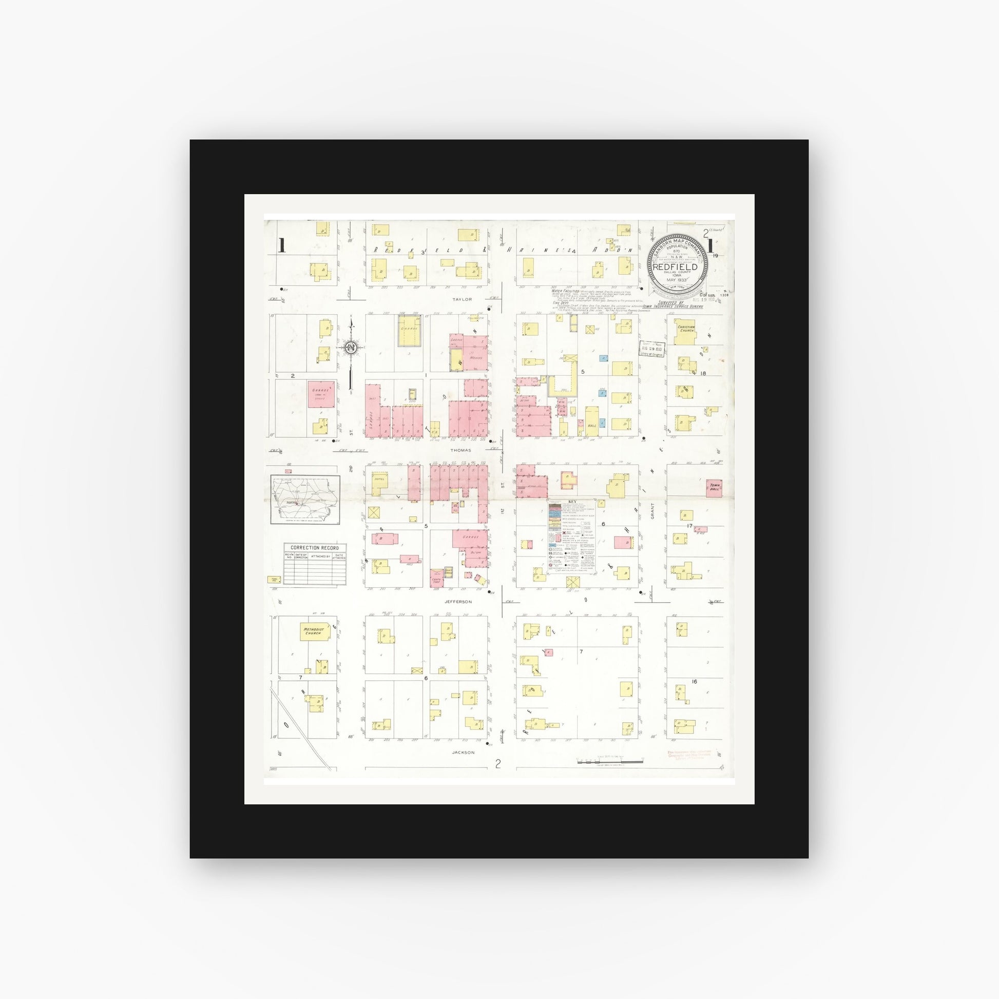 Old map wall art mockup — black gallery frame with white mat — Sanborn Fire Insurance Map from Redfield, Dallas County, Iowa (1933), Sheet #0001
