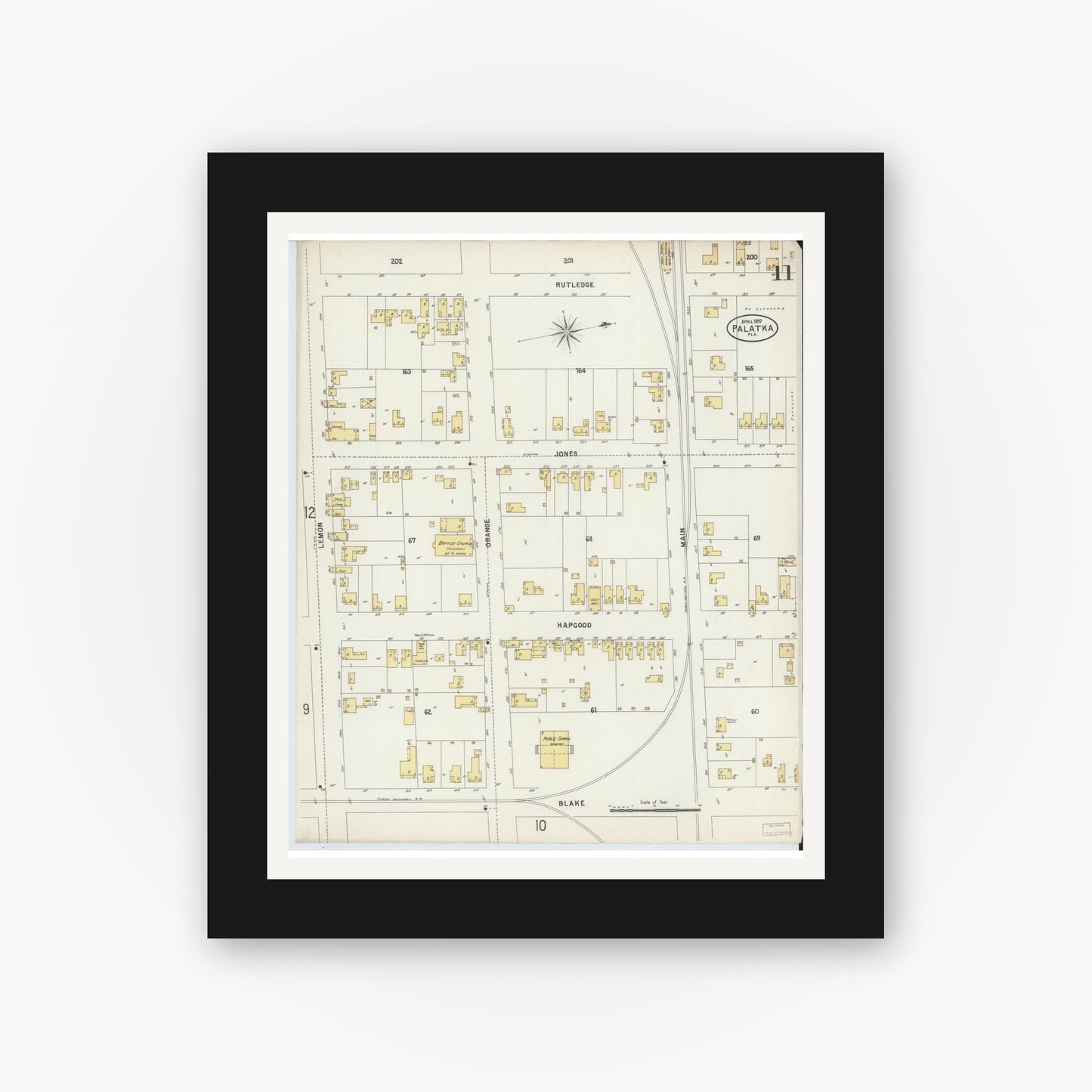 Old map wall art mockup — black gallery frame with white mat — Sanborn Fire Insurance Map from Palatka, Putnam County, Florida (1897), Sheet #0011