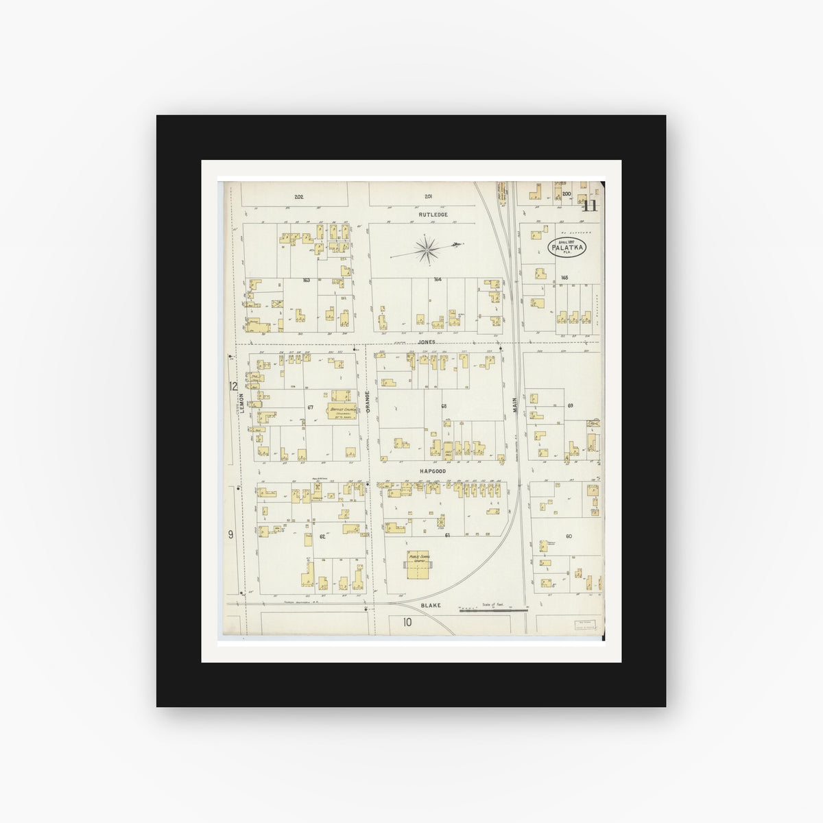 Old map wall art mockup — black gallery frame with white mat — Sanborn Fire Insurance Map from Palatka, Putnam County, Florida (1897), Sheet #0011