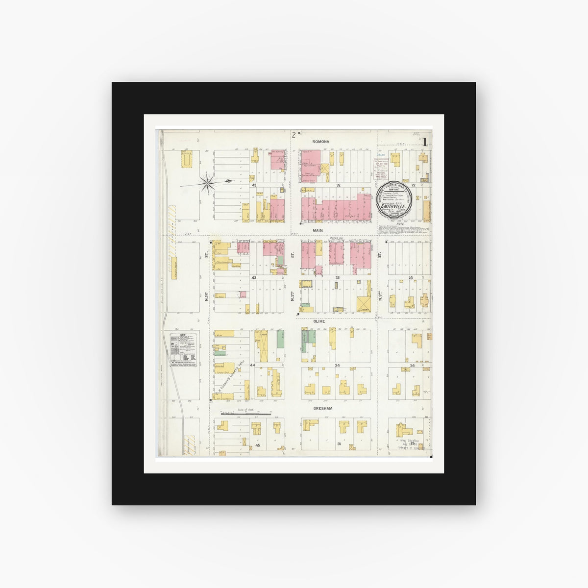 Old map wall art mockup — black gallery frame with white mat — Sanborn Fire Insurance Map from Smithville, Bastrop County, Texas (1900), Sheet #0001