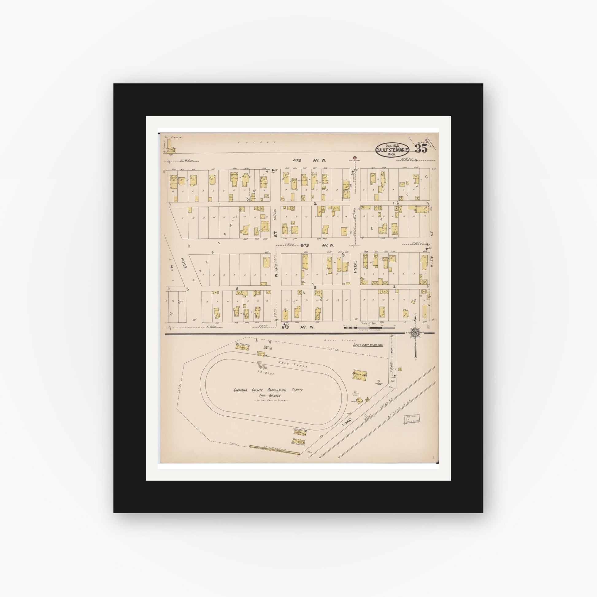 Old map wall art mockup — black gallery frame with white mat — Sanborn Fire Insurance Map from Sault Sainte Marie, Chippewa County, Michigan (1922), Sheet #0035