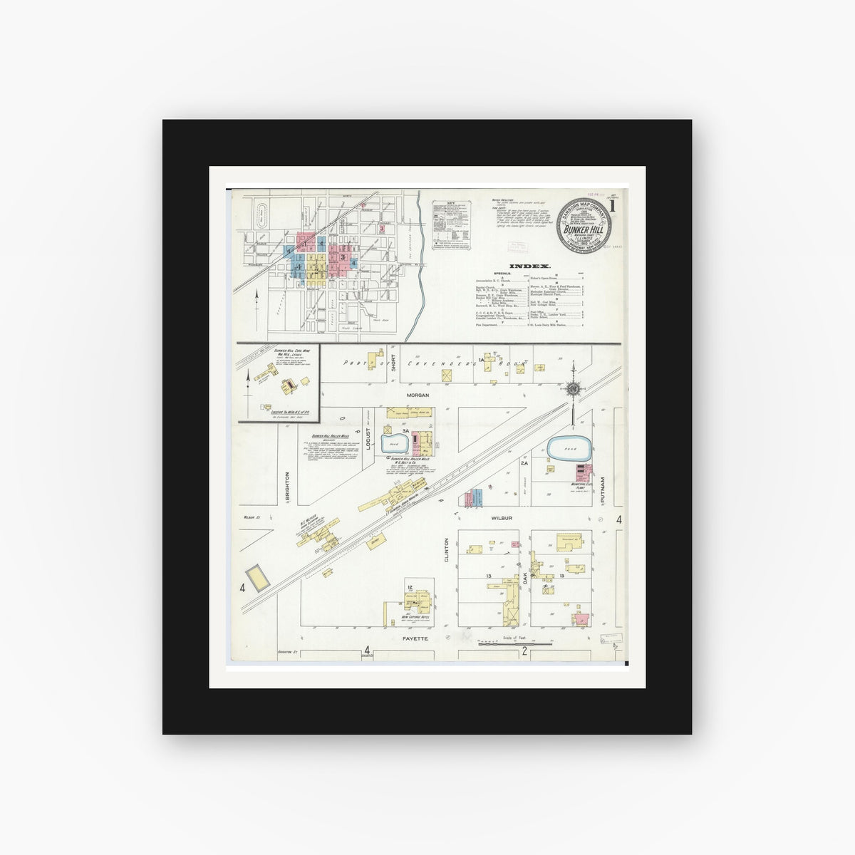 Old map wall art mockup — black gallery frame with white mat — Sanborn Fire Insurance Map from Bunker Hill, Macoupin County, Illinois (1910), Sheet #0001