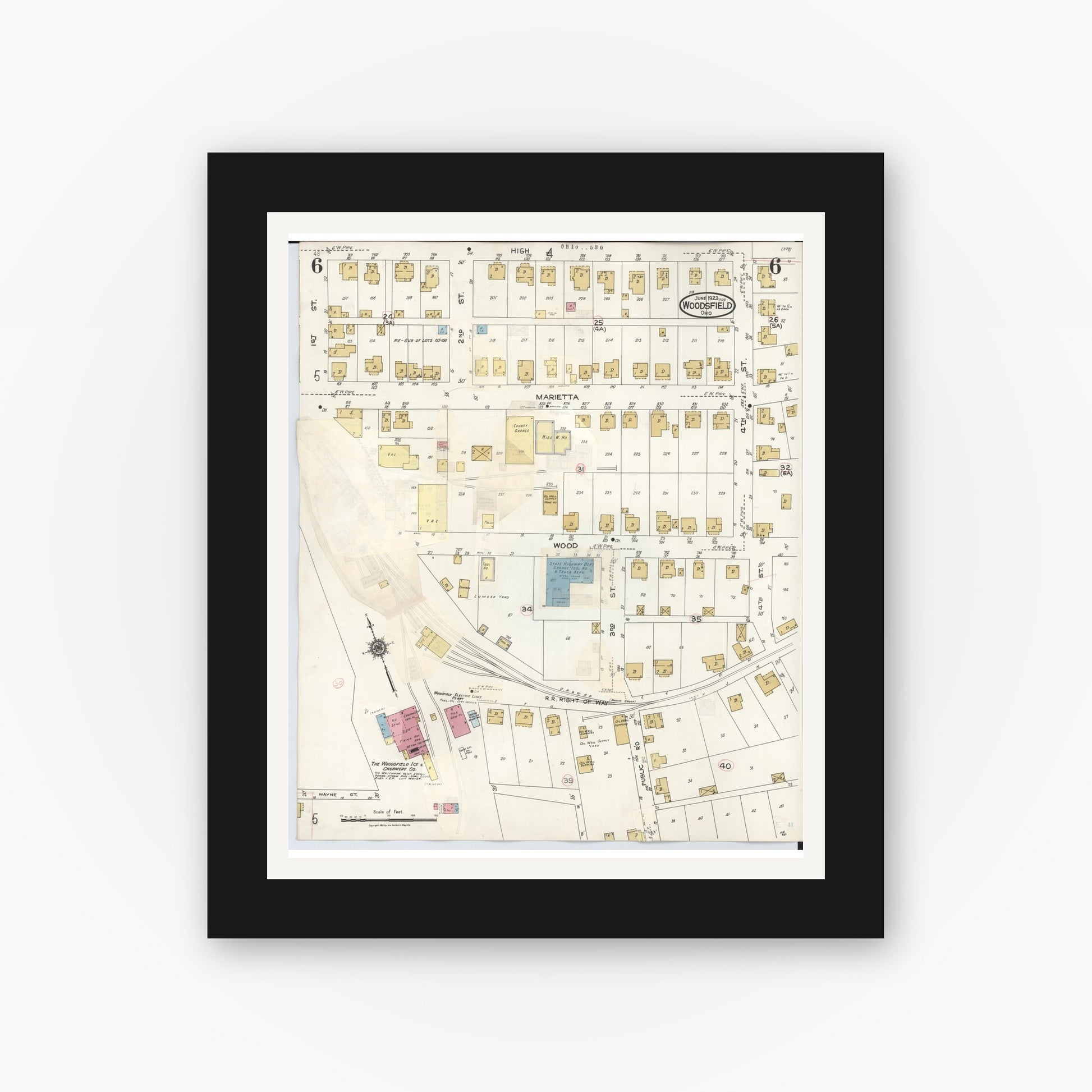 Old map wall art mockup — black gallery frame with white mat — Sanborn Fire Insurance Map from Woodsfield, Monroe County, Ohio (1949), Sheet #0006