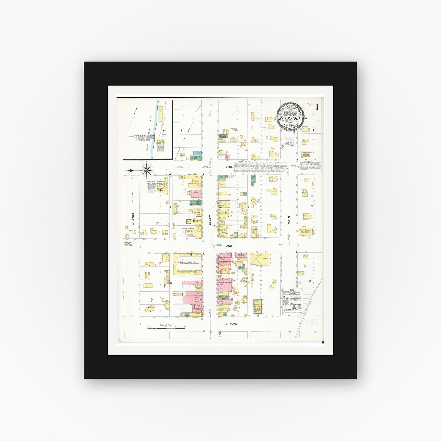 Old map wall art mockup — black gallery frame with white mat — Sanborn Fire Insurance Map from Rockford, Floyd County, Iowa (1909) â€” Complete Set