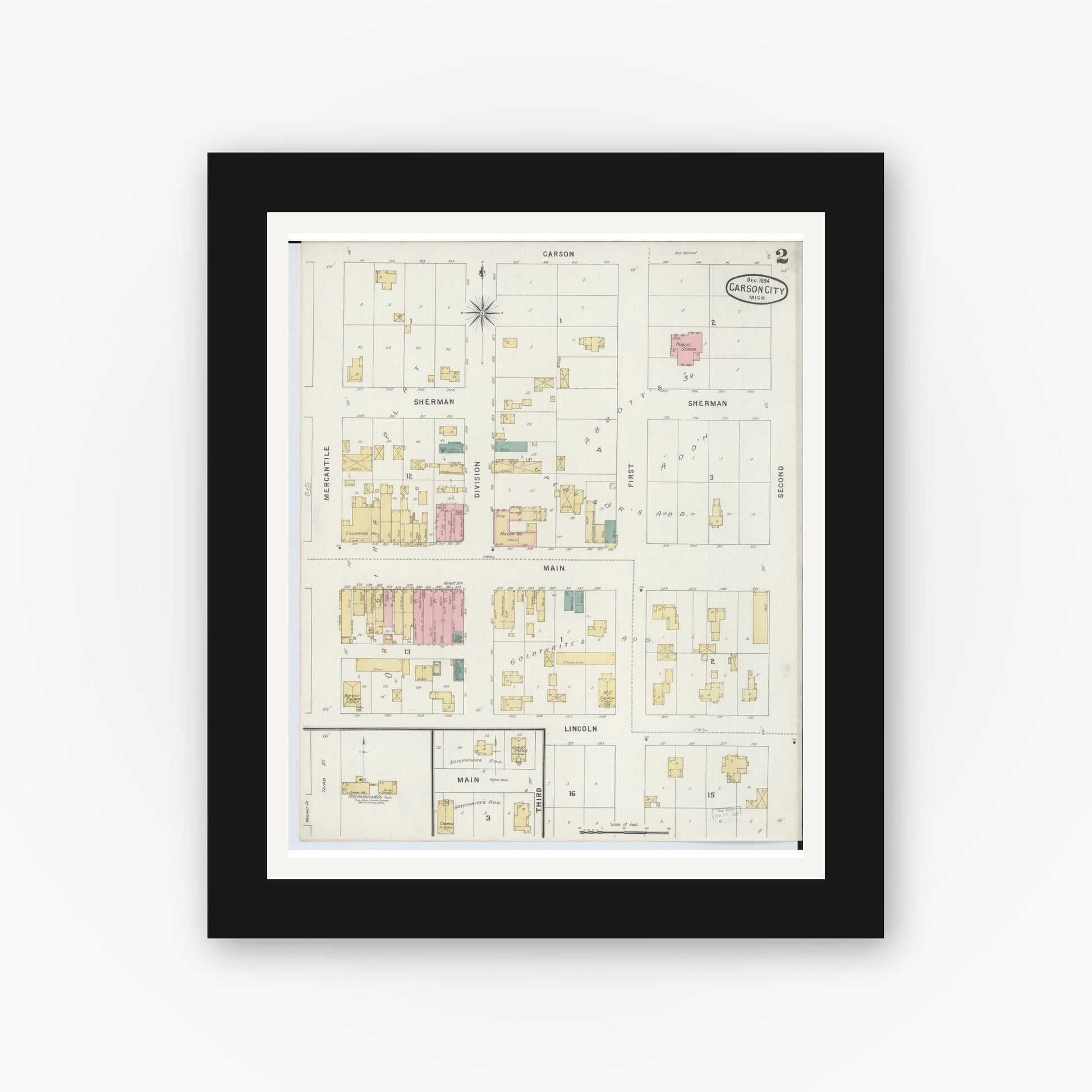 Old map wall art mockup — black gallery frame with white mat — Sanborn Fire Insurance Map from Carson City, Montcalm County, Michigan (1894), Sheet #0002
