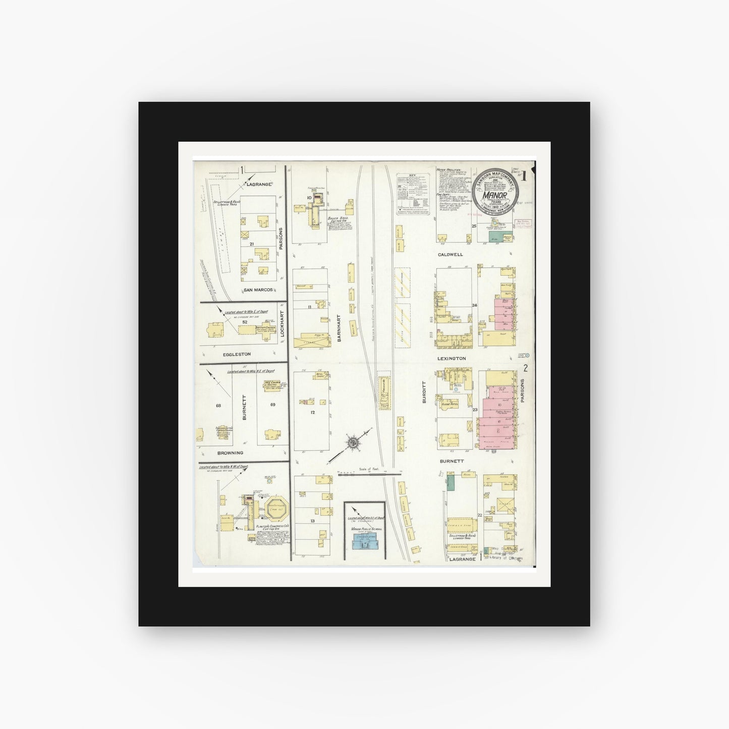 Old map wall art mockup — black gallery frame with white mat — Sanborn Fire Insurance Map from Manor, Travis County, Texas (1910), Sheet #0001